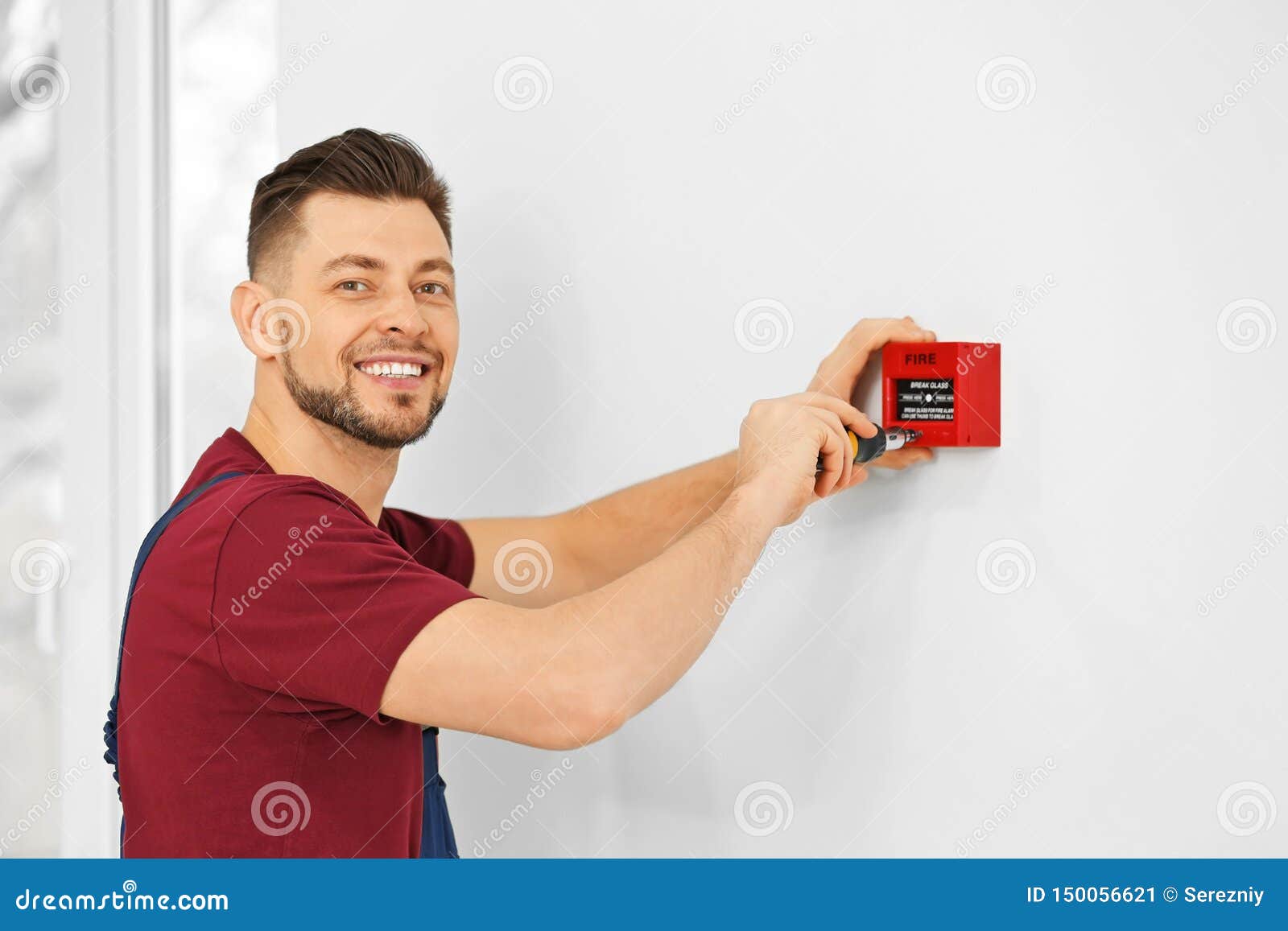 Electrician Installing Fire Alarm System Stock Image Image of person