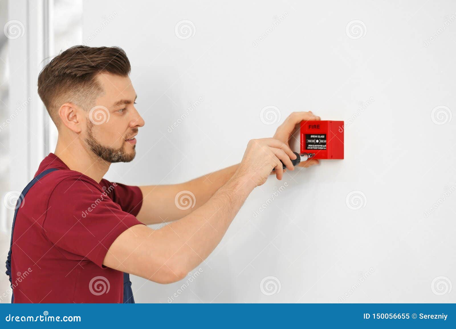 Electrician Installing Fire Alarm System Stock Image Image of
