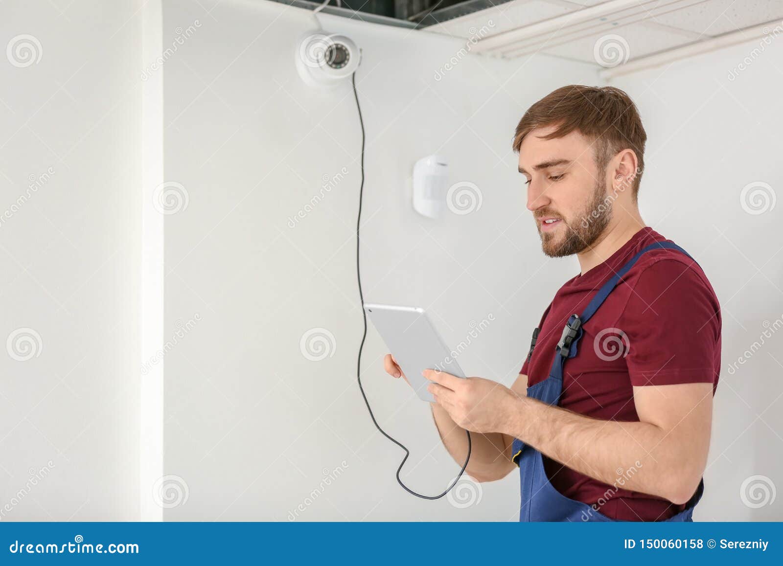 Electrician Installing Security Camera Indoors Stock Photo Image of