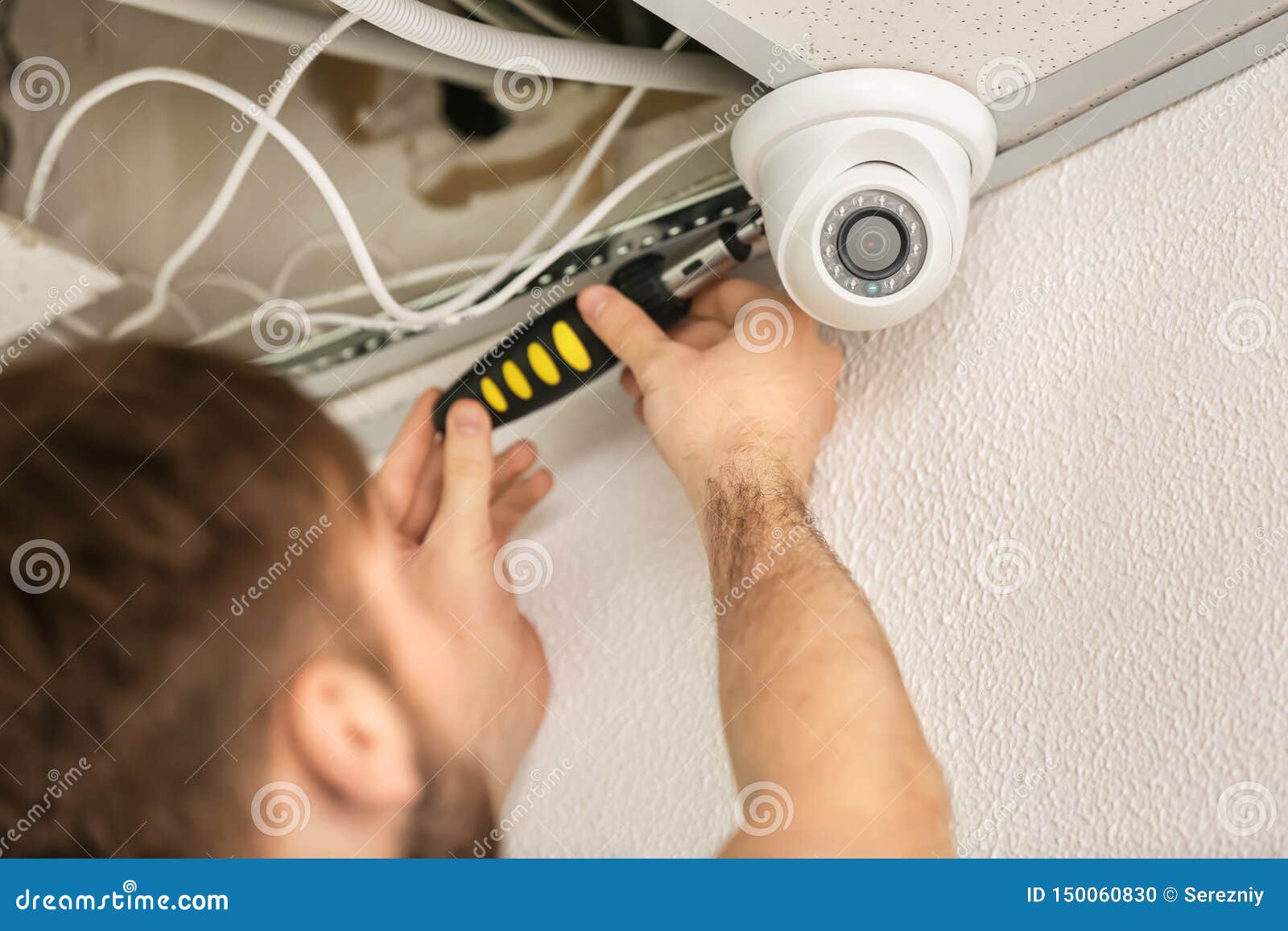 Electrician Installing Security Camera Indoors Stock Photo Image of