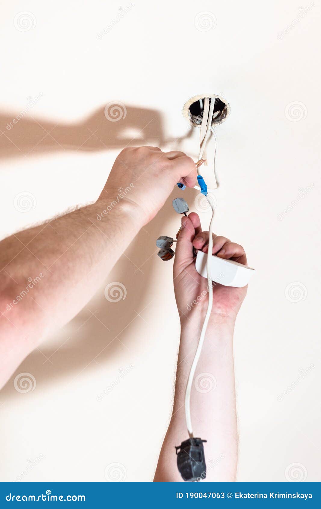 Electrician Mounts Electrical System for Lamp Stock Image Image of