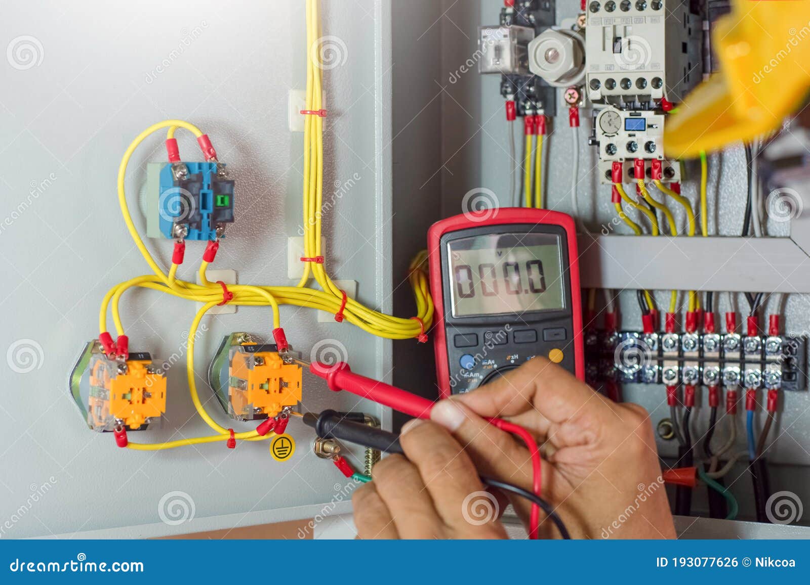 Electrician Man Checking Electrical Terminal Box, Control Panel with