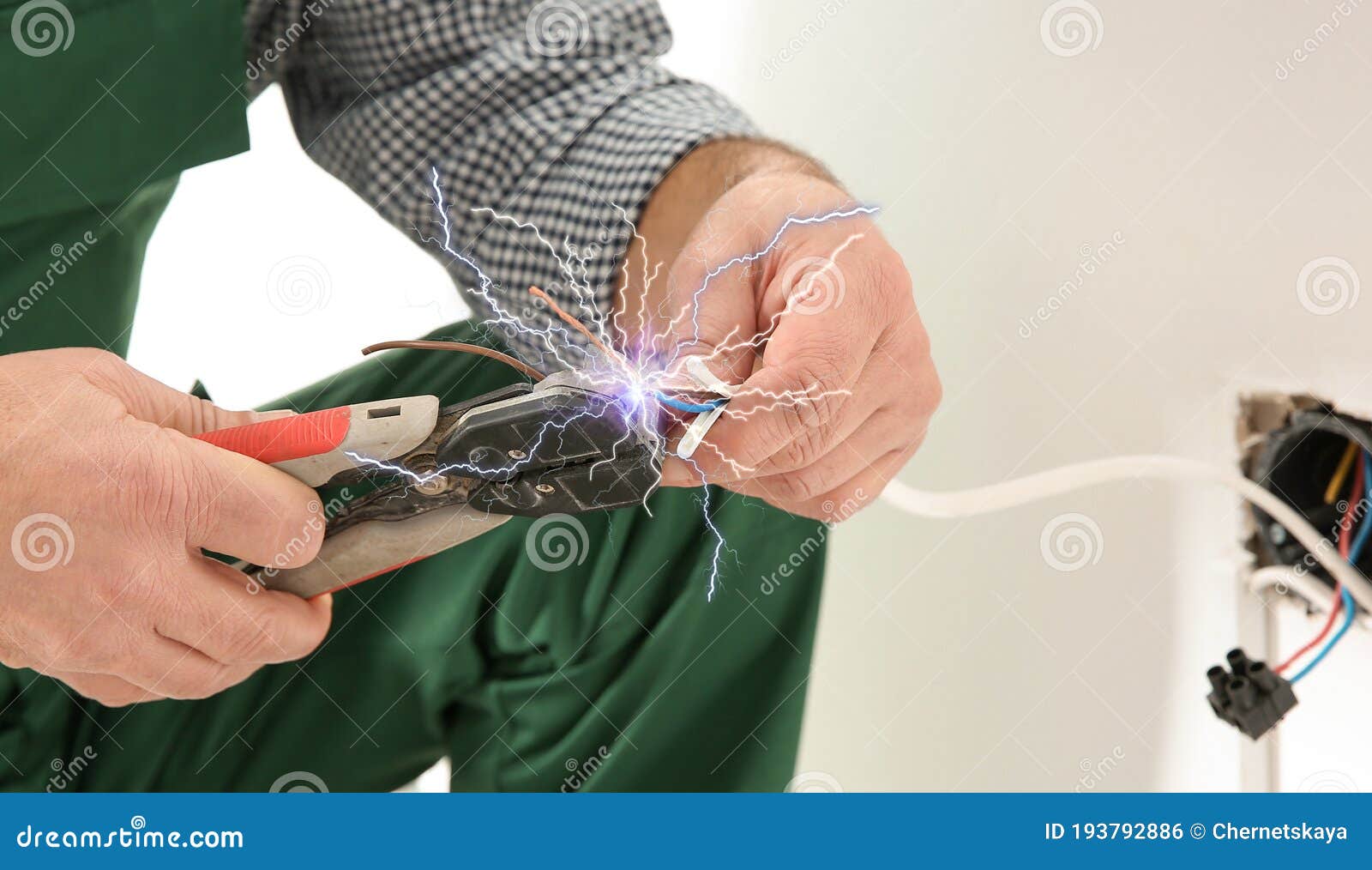 electrician receiving electric shock while working