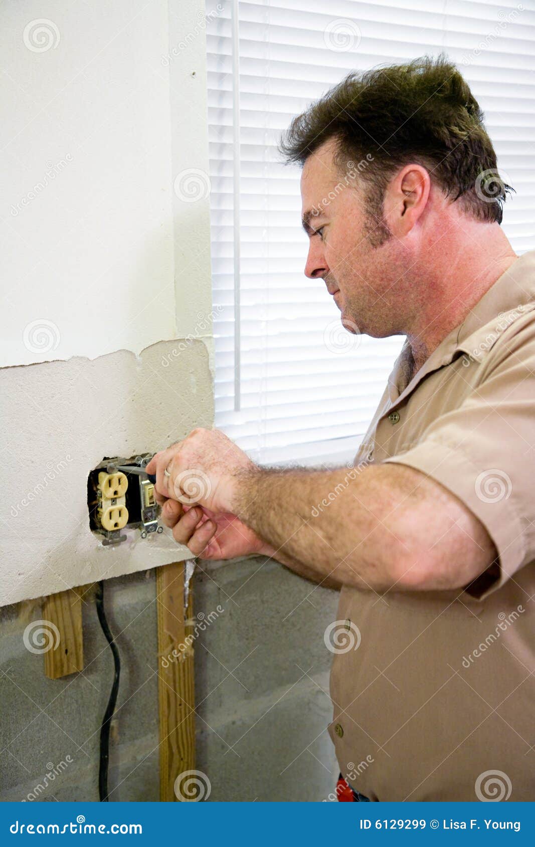 electrician with receptacle