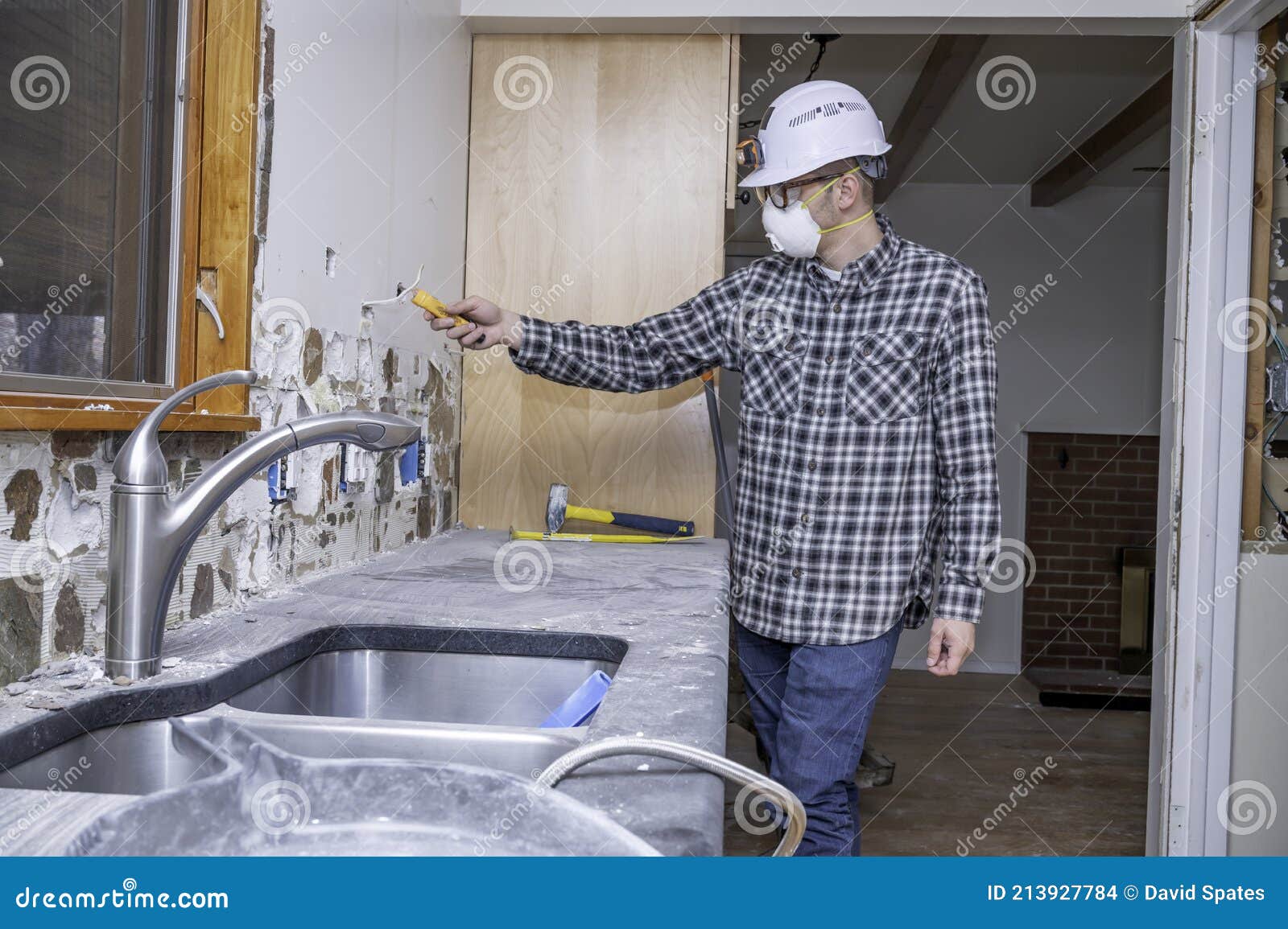 Electrician in Remodeled Kitchen Stock Photo Image of interior, test