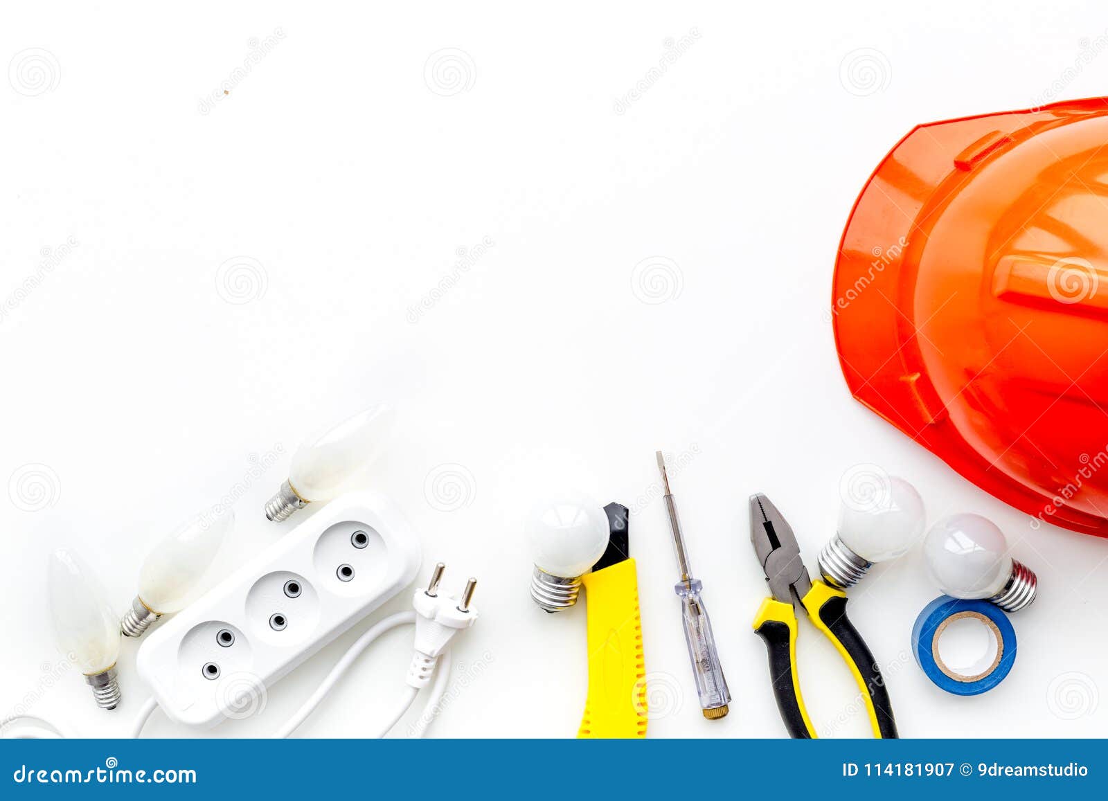Electrician Work Concept. Hard Hat, Tools, Socket Outlet on White