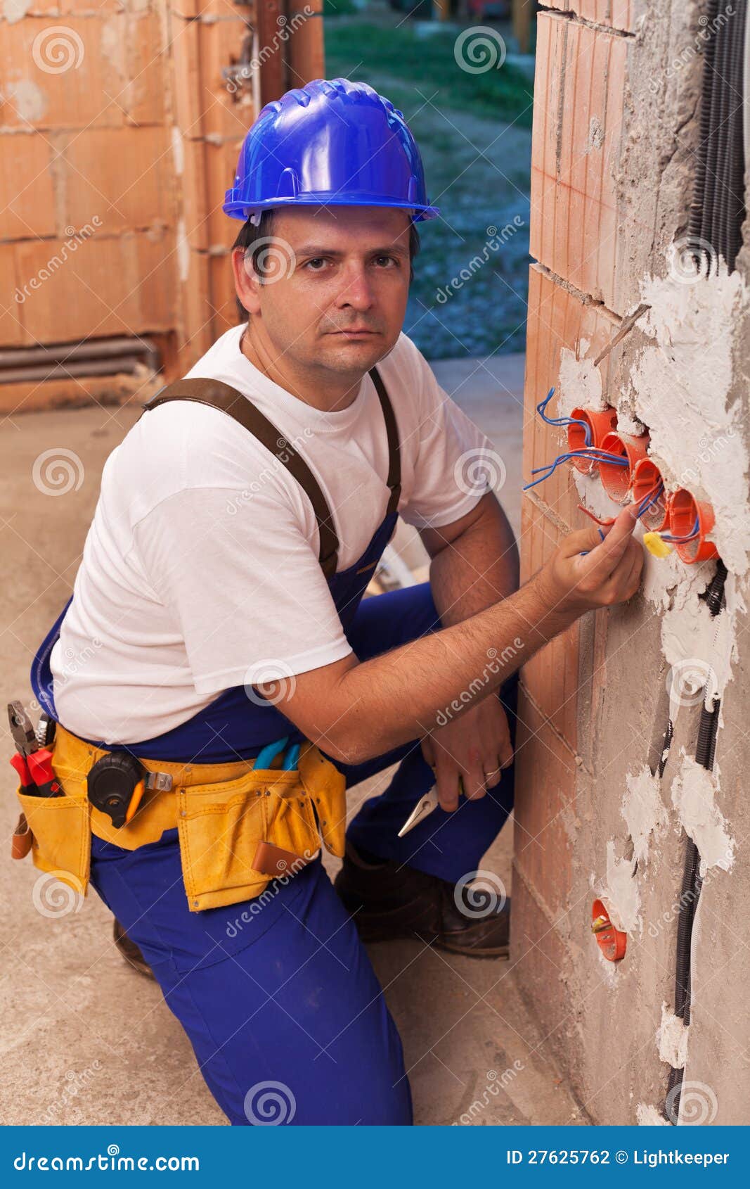 Electrician Working with Wires Stock Photo Image of house, laborer