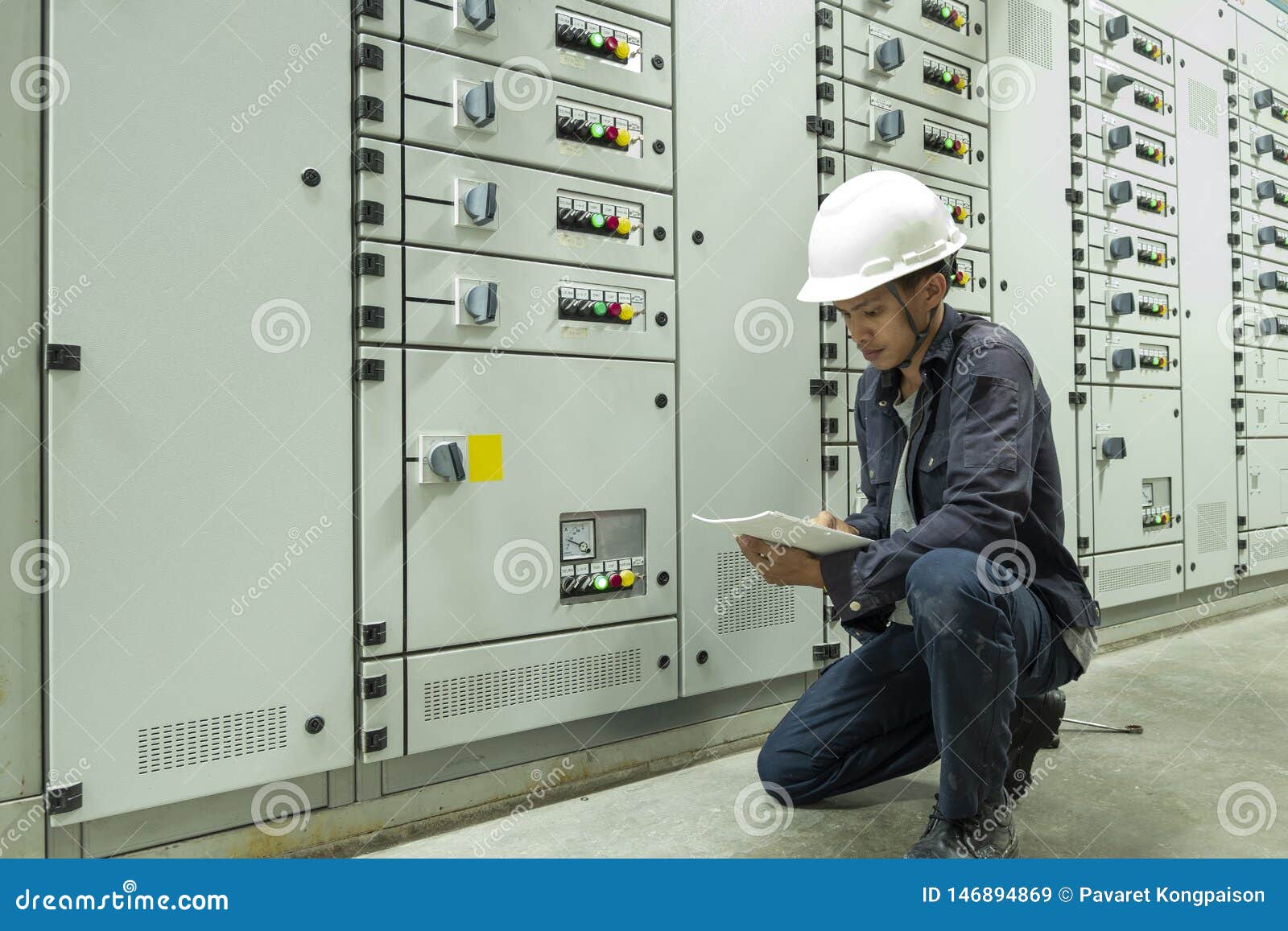 Electricians are Checking Electrical Control Panels in Industrial Plants Stock Image Image of