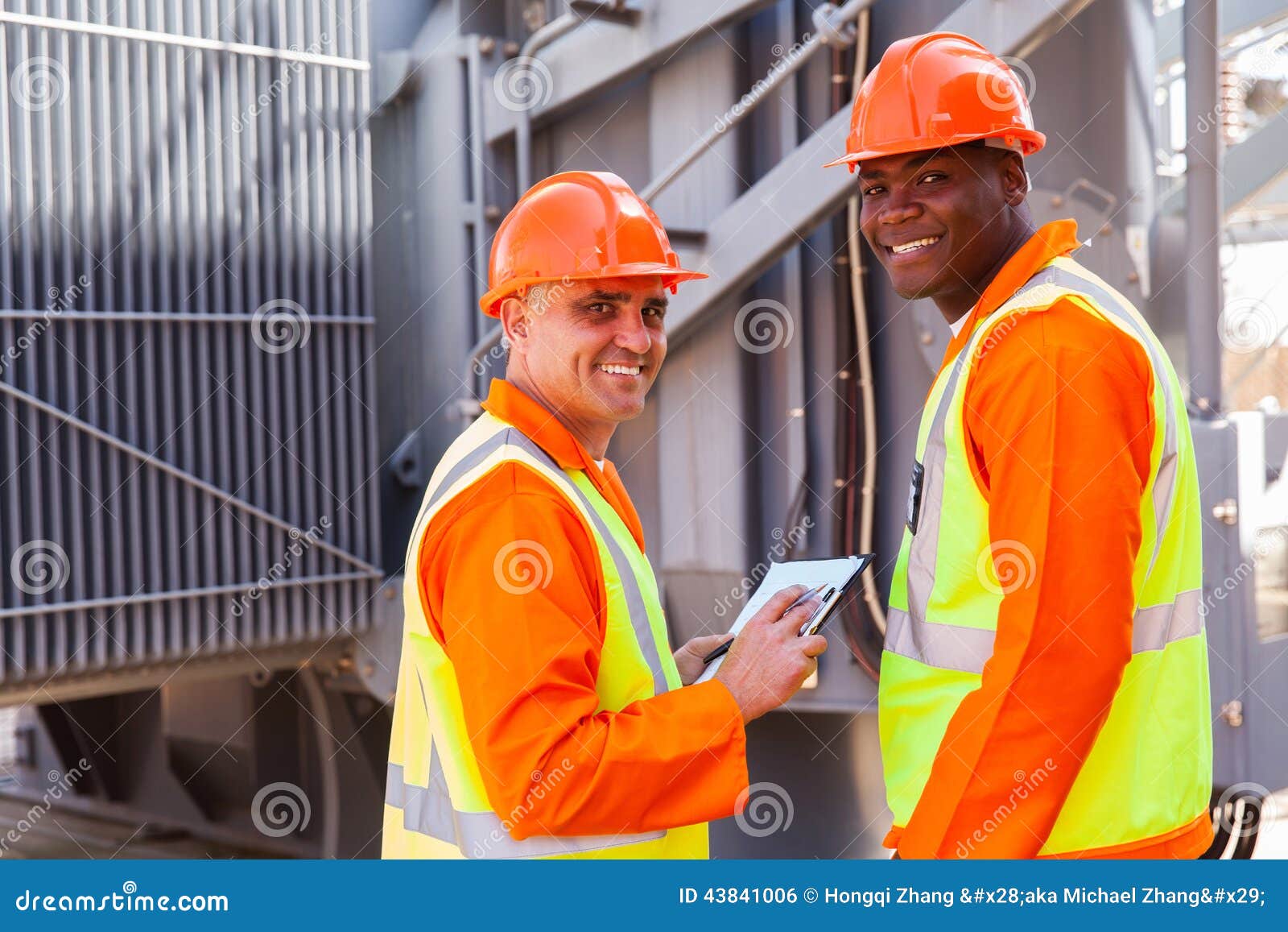 Electricians looking back stock photo. Image of facility 43841006
