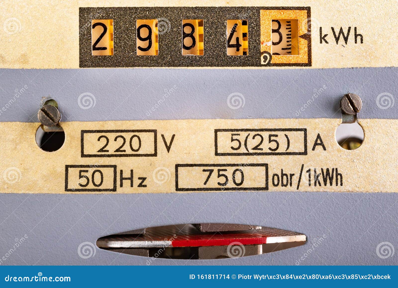 Electricity Meter On A White Wall. A Device For Measuring The