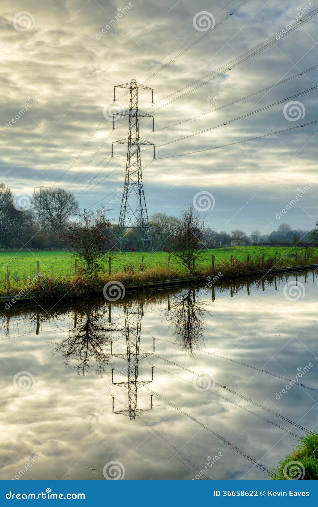 Electricity Pylon Reflected in Water Stock Photo Image of clouds