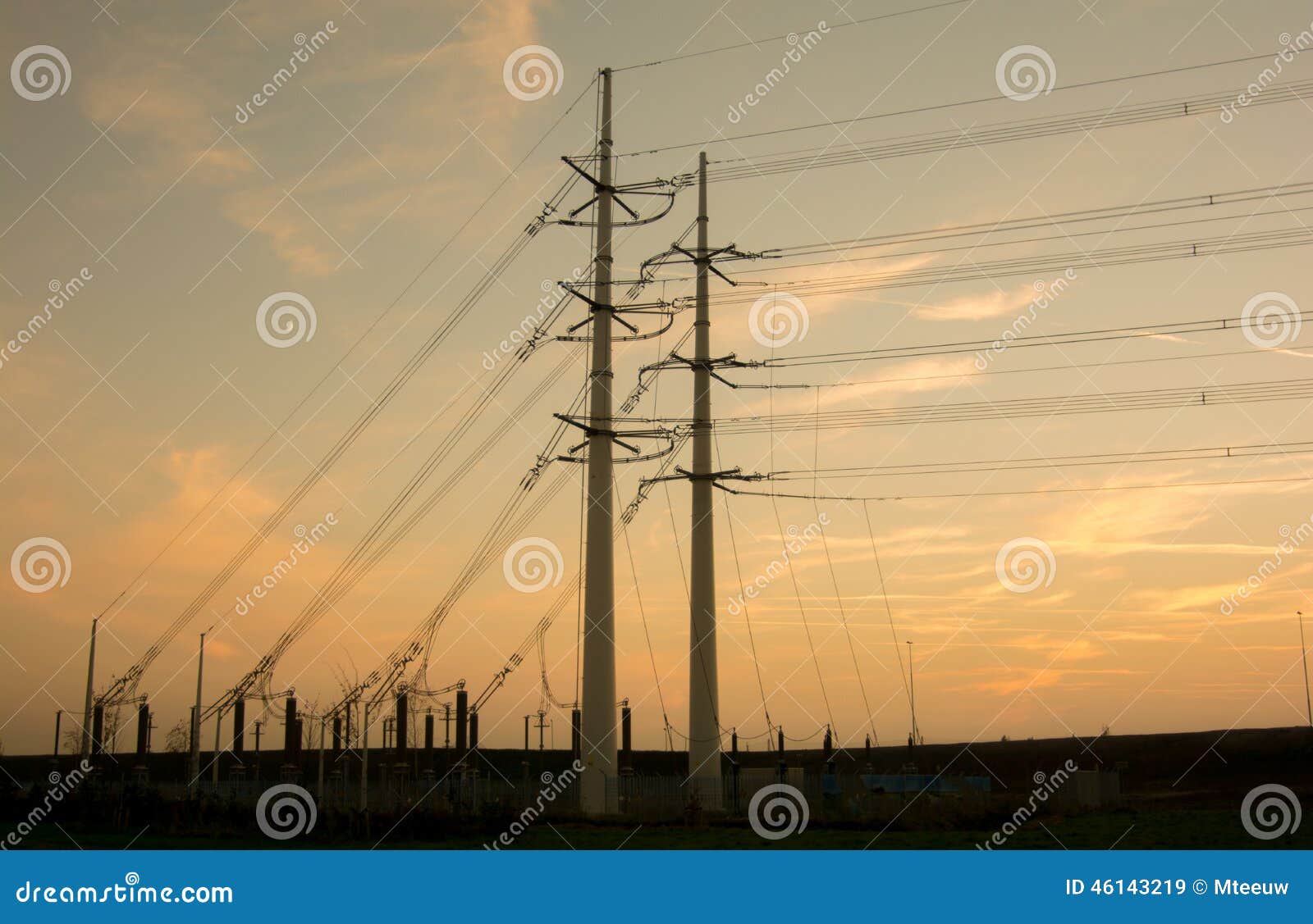 electricity pylons with orange background
