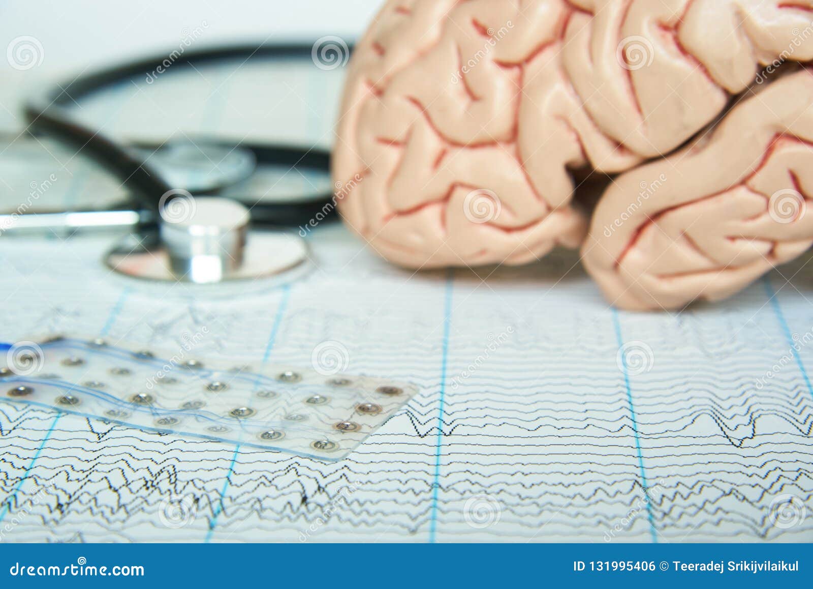 Electrode Recording Brain Waves On EEG Paper Stock Photography ...