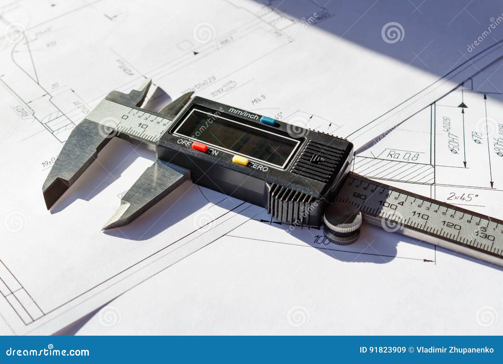 The Caliper Lies On The Technical Drawing, After The Technical Process