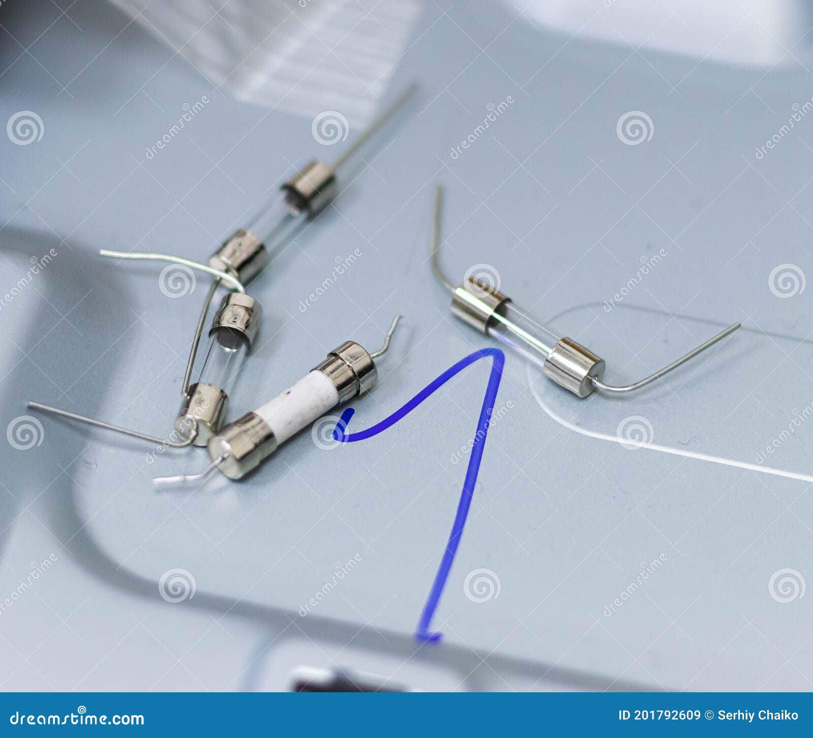 Electronic Components in Grey Background. Four Components Stock Image
