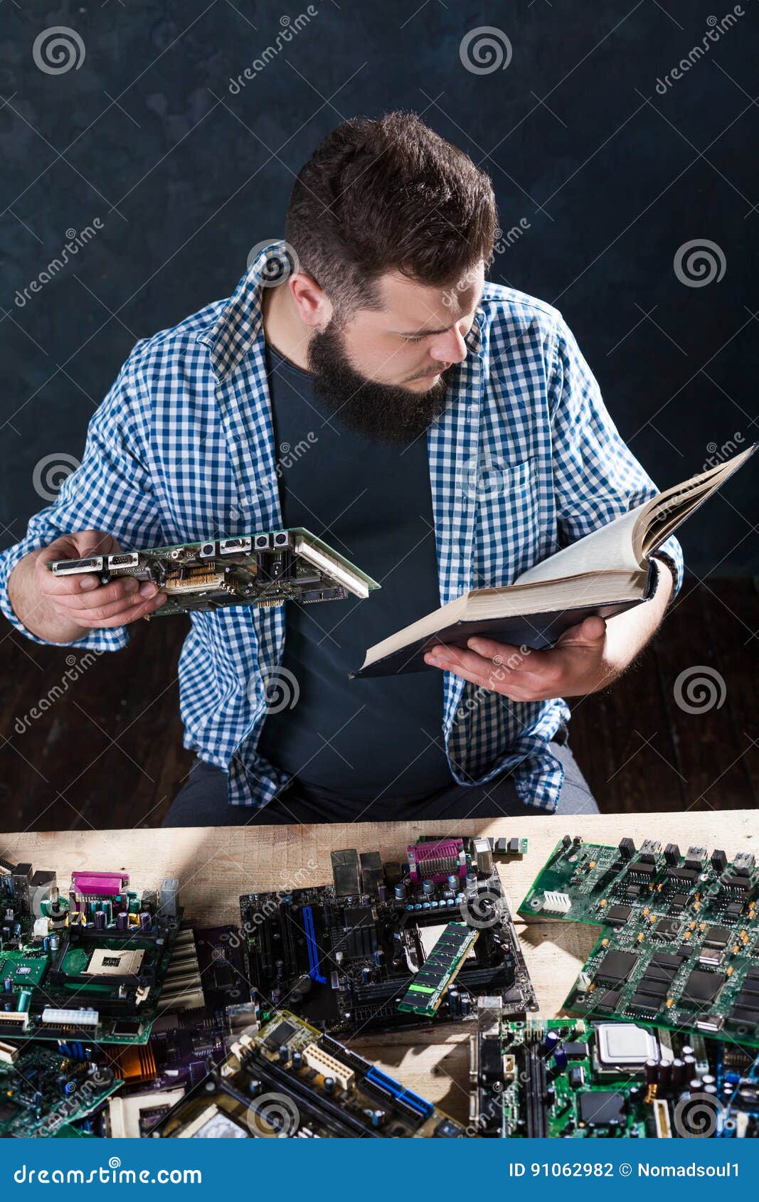 Electronic Devices Repairing and Diagnostic Techs Stock Photo Image