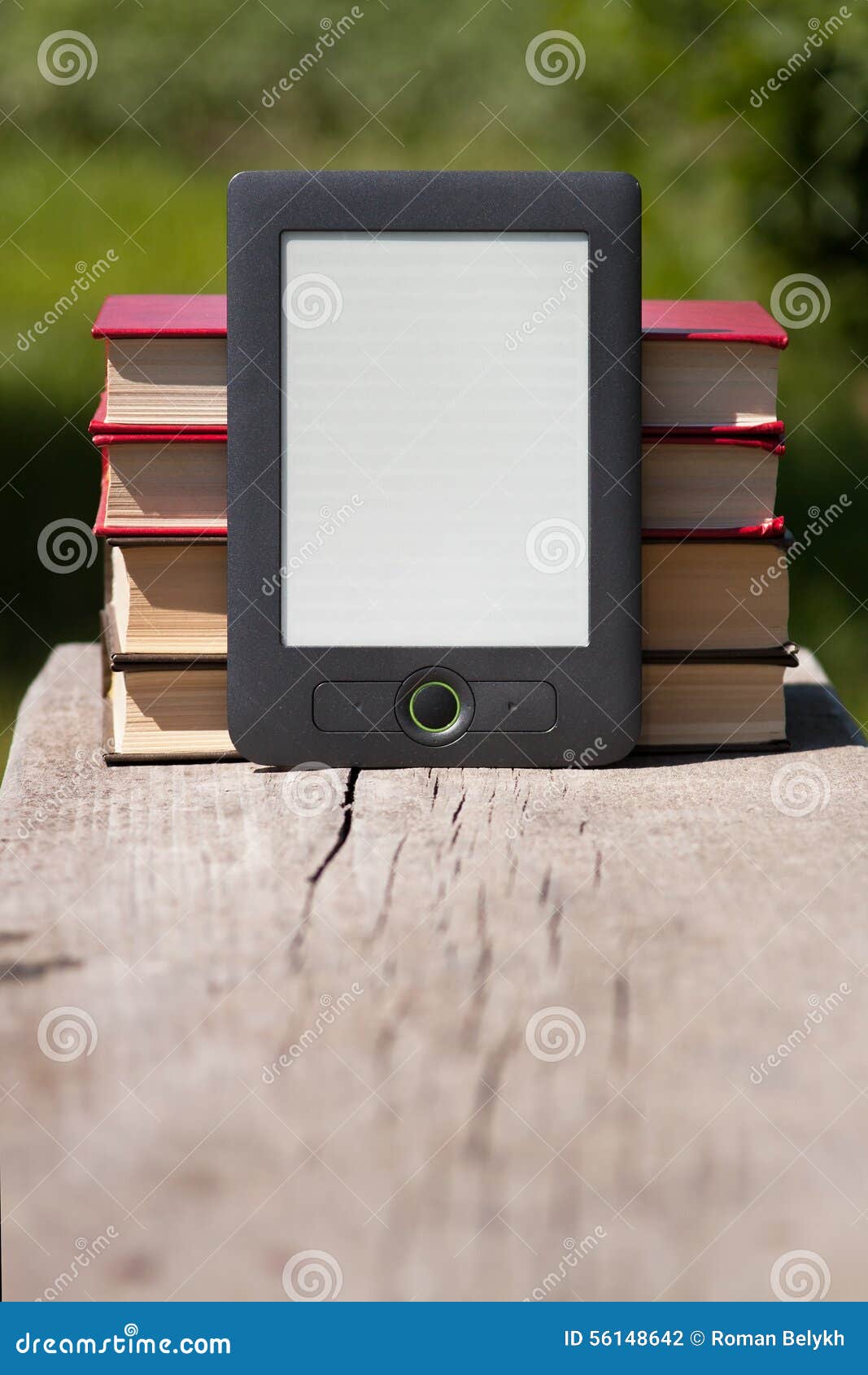 Electronic and Paper Books on Wooden Bench. Stock Photo Image of