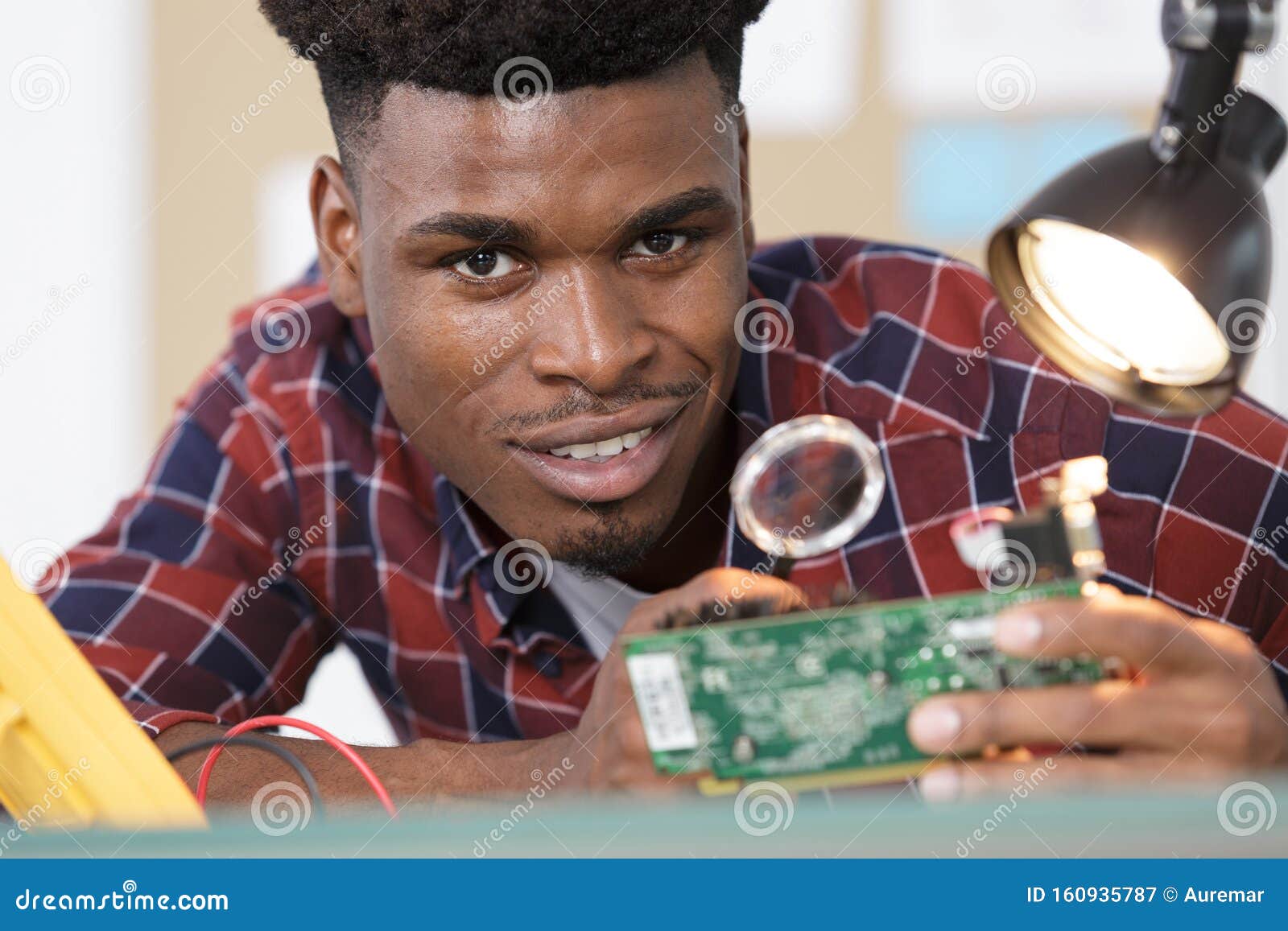Electronics Repair Master Using Magnifying Glass Stock Image Image of