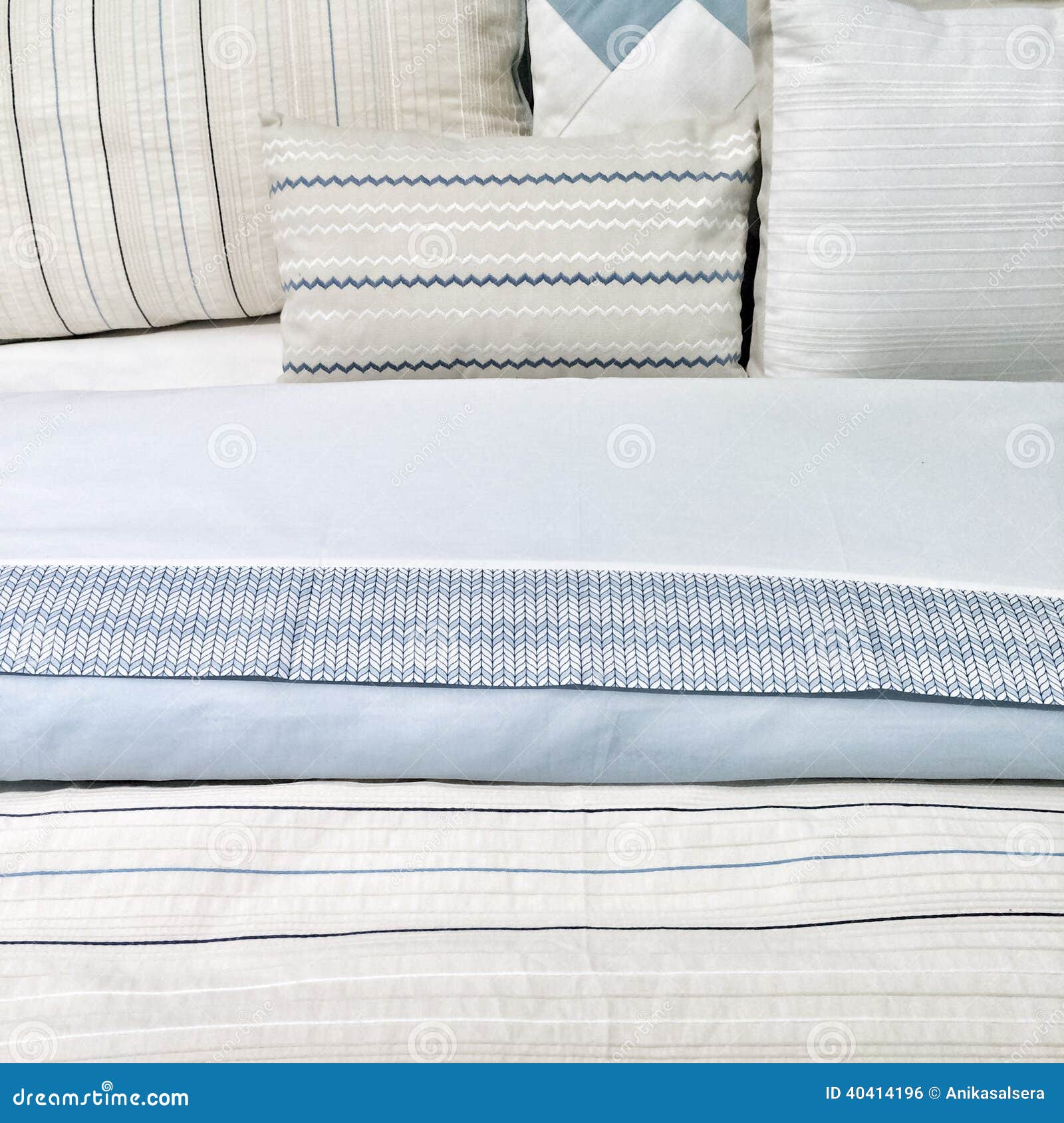Elegant blue bed linen stock photo. Image of blanket 40414196
