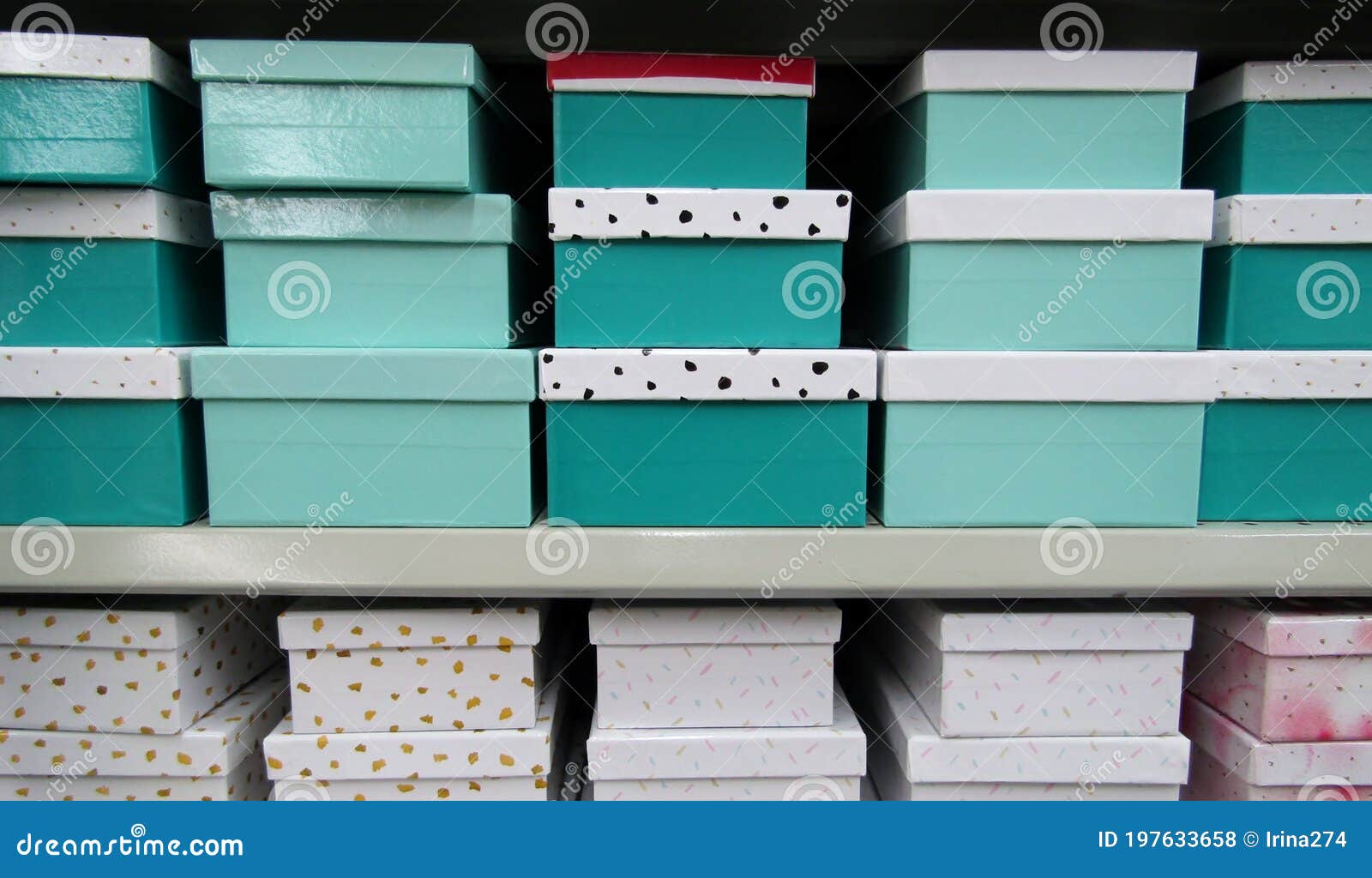 Elegant Cardboard Gift Boxes with Lids on Store Shelf. Stock Photo
