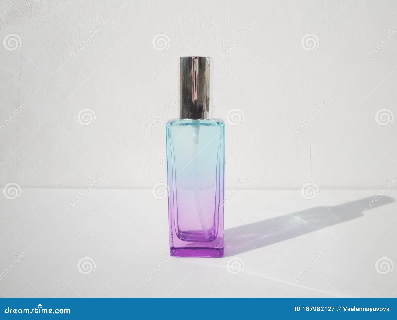 pink perfume blue bottle