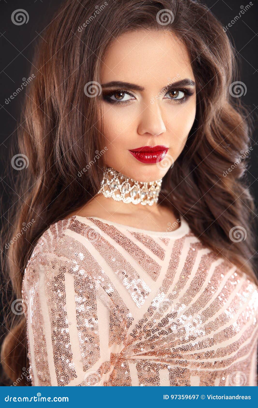 elegant fashion brunette woman portrait. wavy hair style. red li