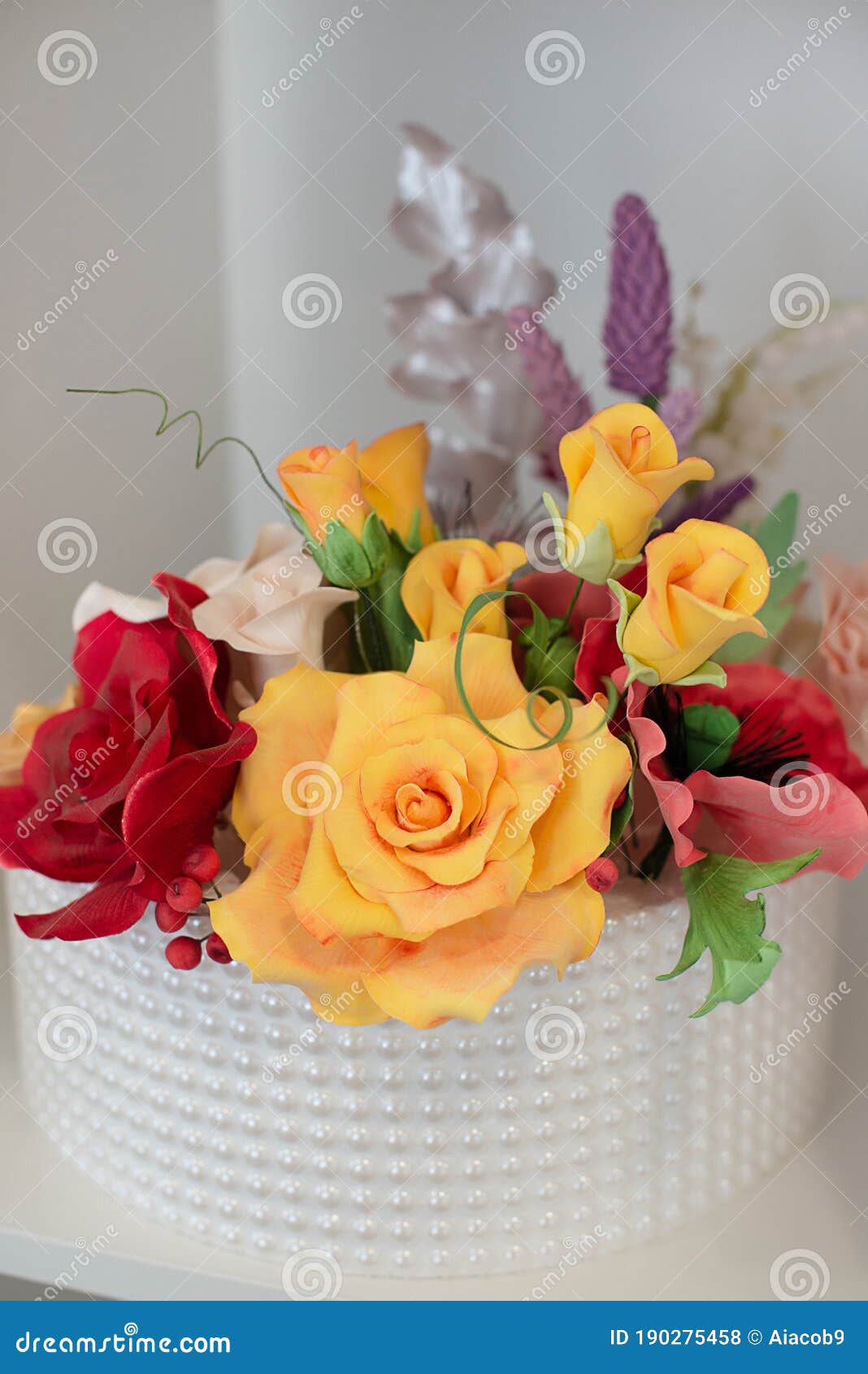 Elegant Floral Decoration for a Wedding Cake, Covered in Royal ...