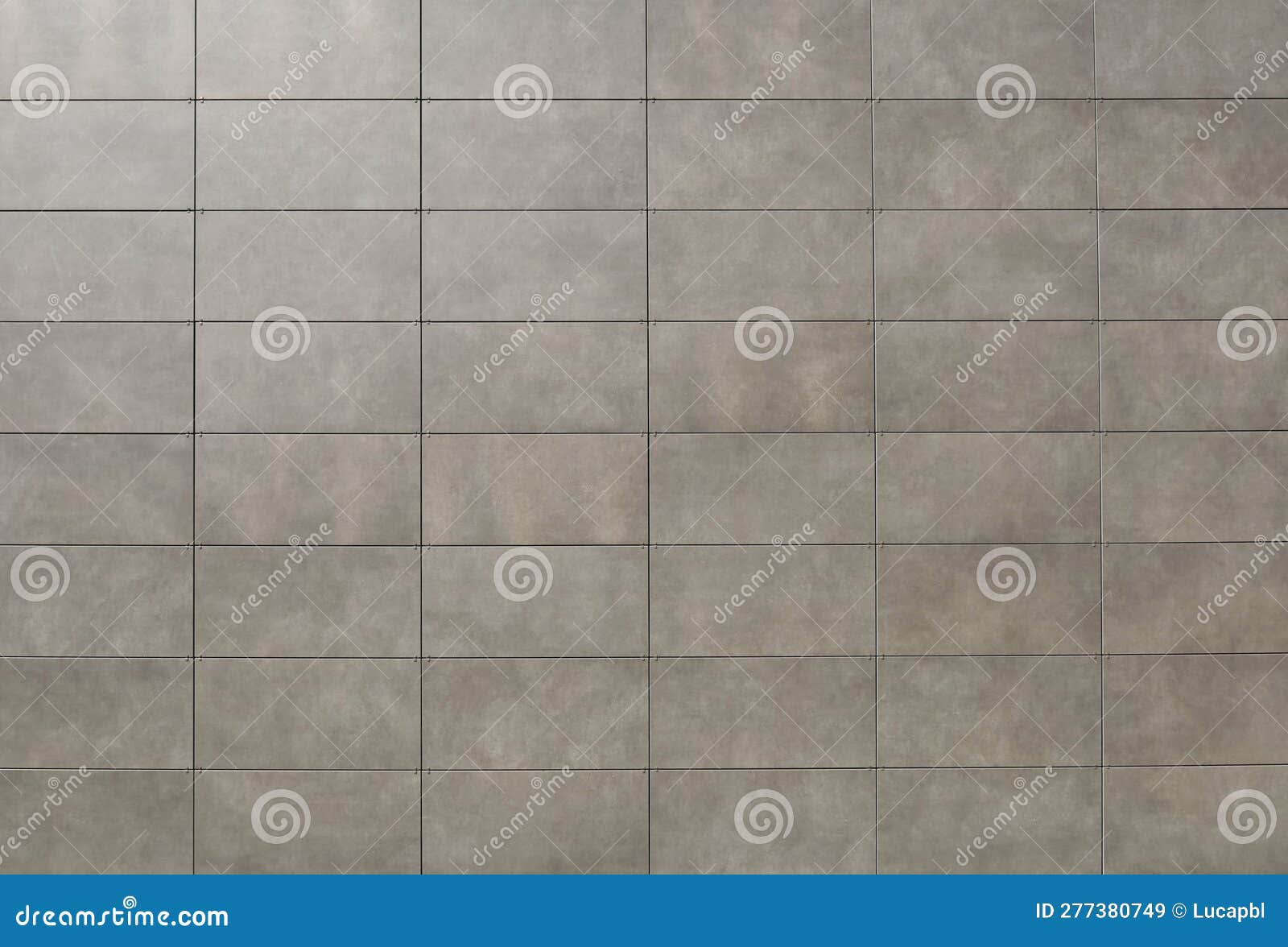 Elegant Gray Stone Tiles for Ventilated Facade Cladding. Stock Image