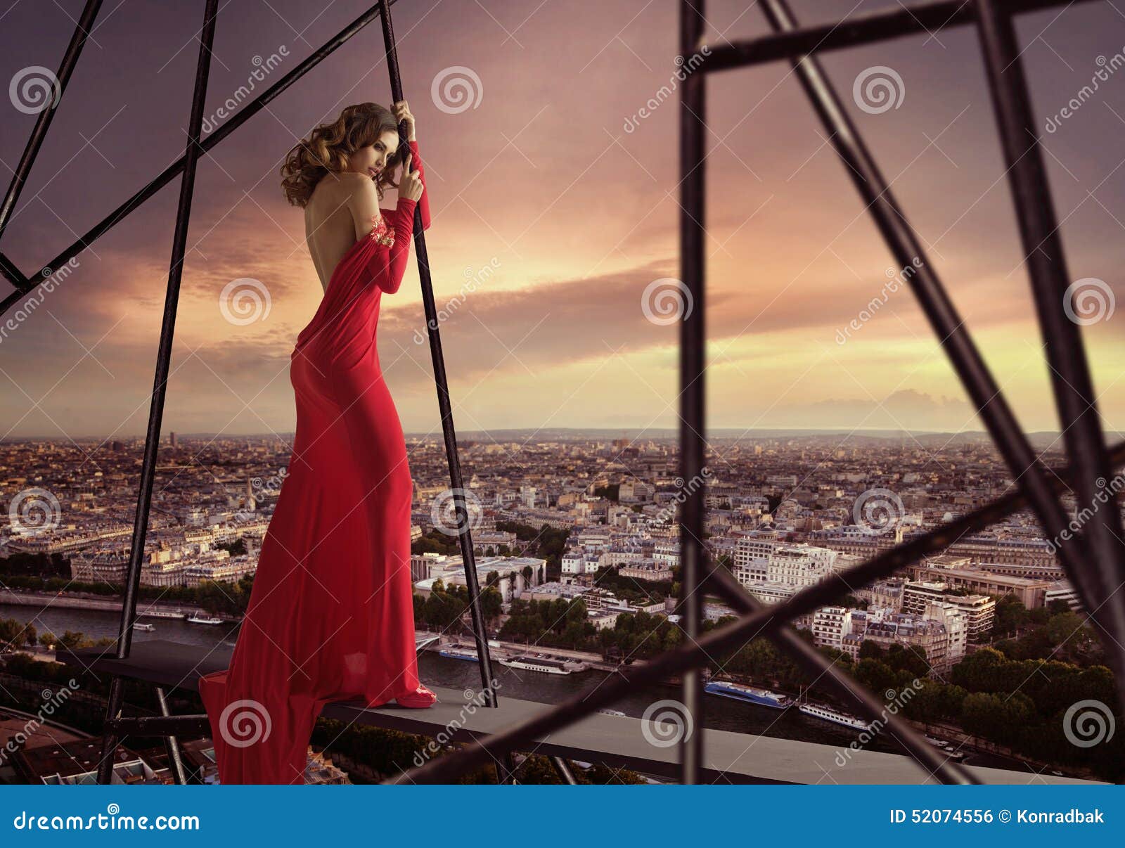Elegant Lady Standing On The Edge Of The Roof Stock Photo 