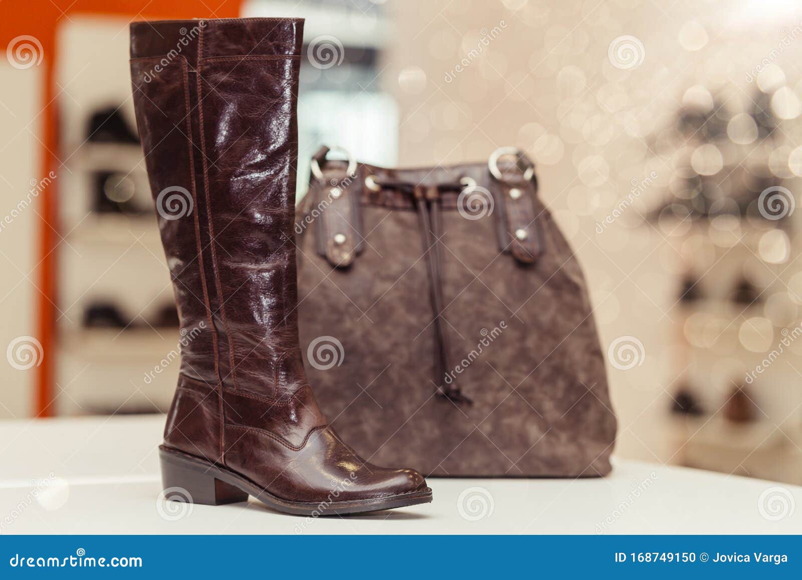 Elegant Leather Women Boots and Women Handbag in the Background on the ...