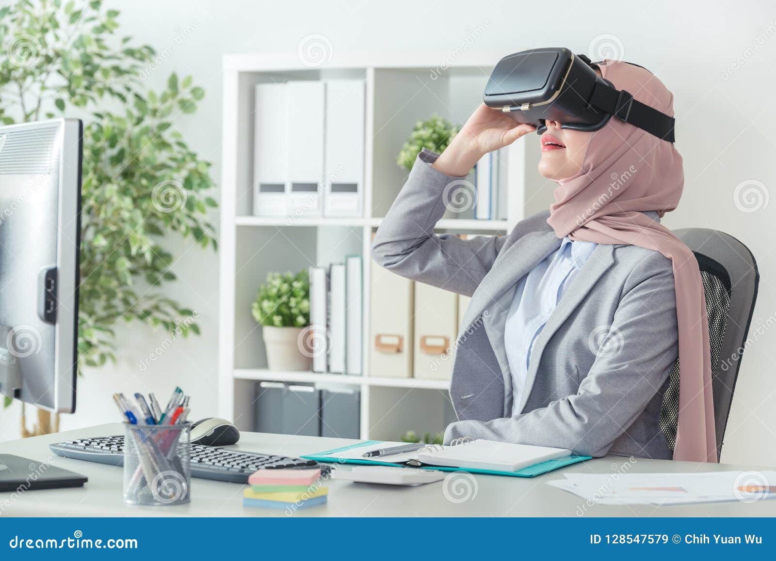 Office Worker Wearing VR Technology Device Stock Image - Image of ethnic,  muslim: 128547579