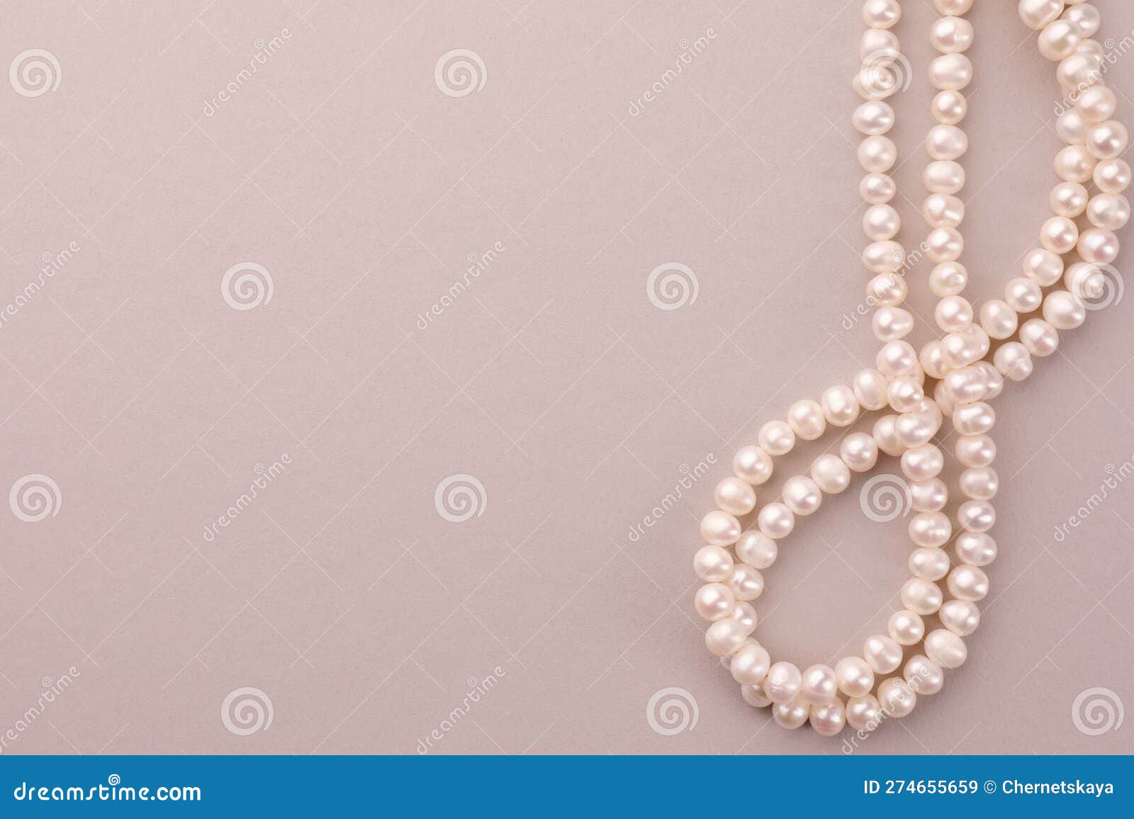 Young woman wearing elegant pearl necklace on pink background, back view.  Space for text Stock Photo | Adobe Stock