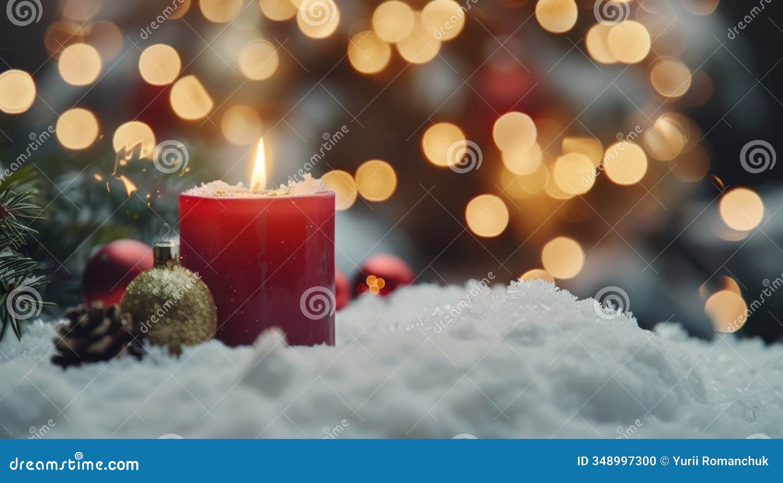 elegant red candle surrounded by christmas decor and snow, perfect for festive card 