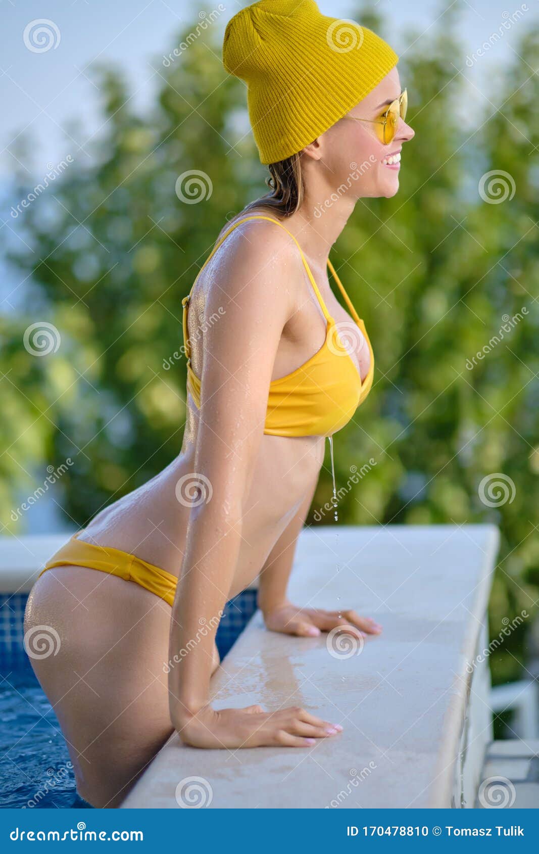 Elegant Woman in Luxury Bikini on the Sun-tanned Slim and Shapely Body is  Posing Near the Swimming Pool. Sunbathing by Stock Image - Image of body,  natural: 152237901