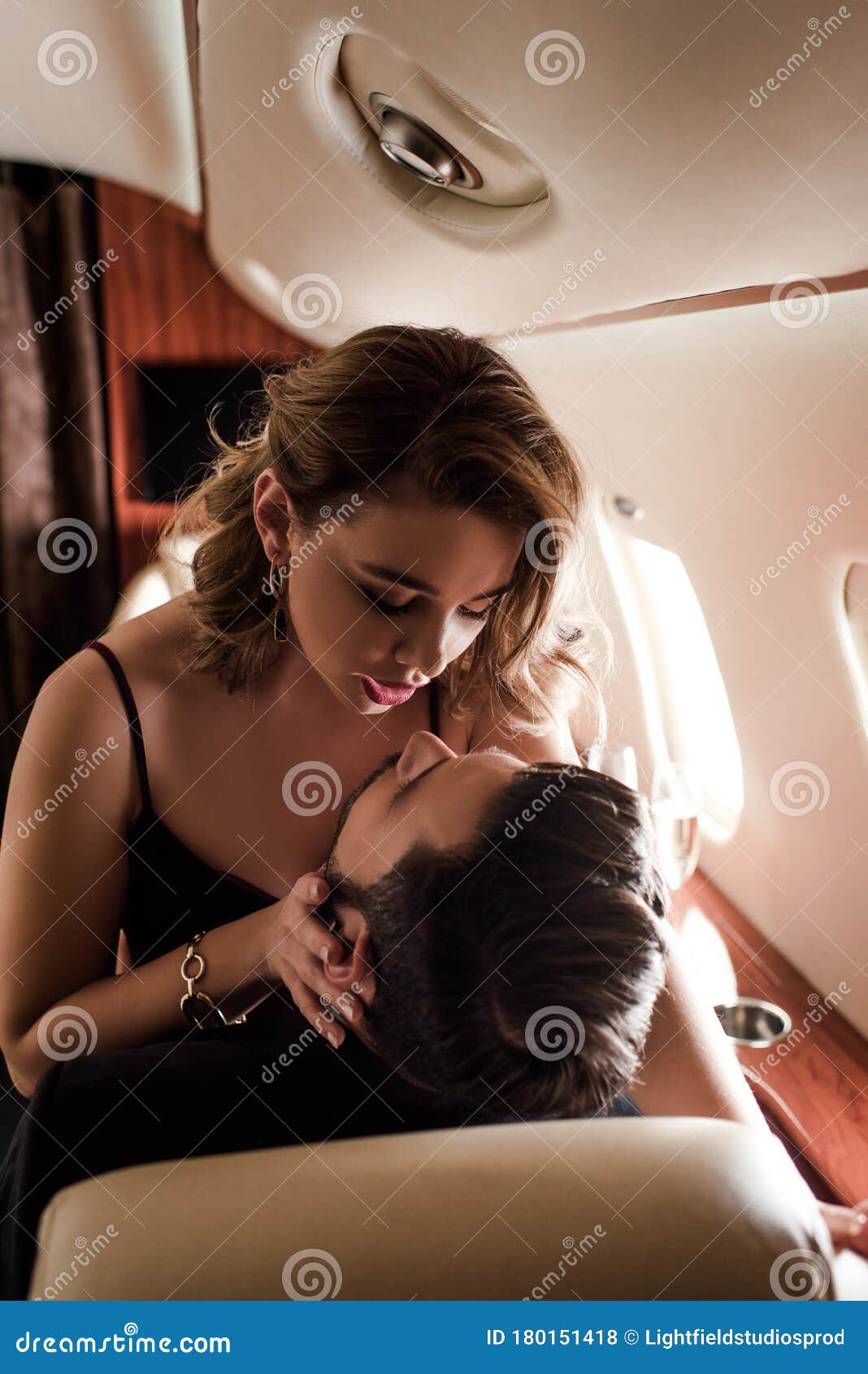 lo hizo Ninguna eximir Young Woman Touching Face of Man in Plane Stock Photo - Image of flight, aviation: 180151418 lo hizo Ninguna eximir Young Woman Touching Face of Man in Plane Stock Photo - Image of flight, aviation: 180151418