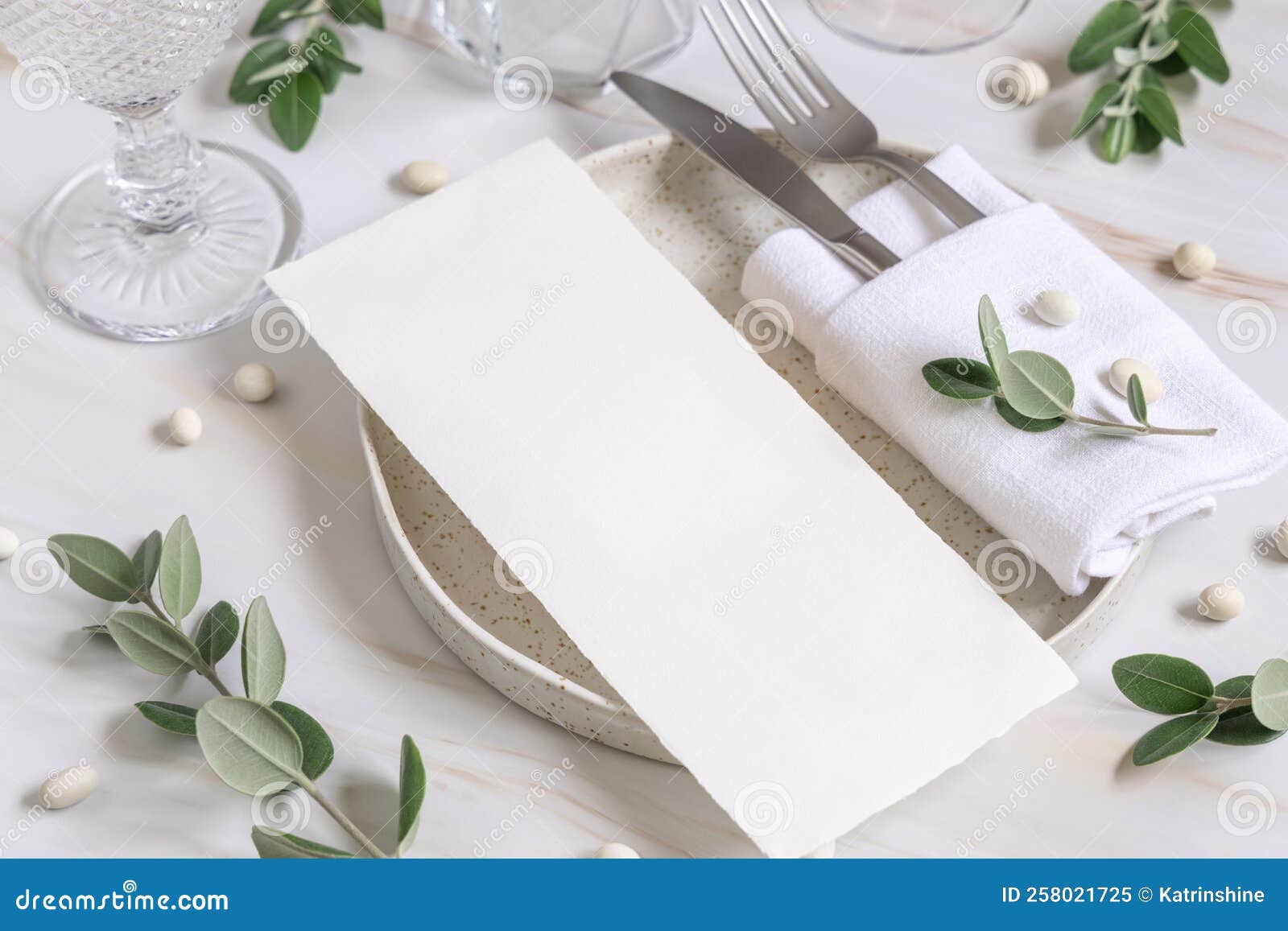 Elegant Table Setting with a Card Decorated with Eucalyptus Branches