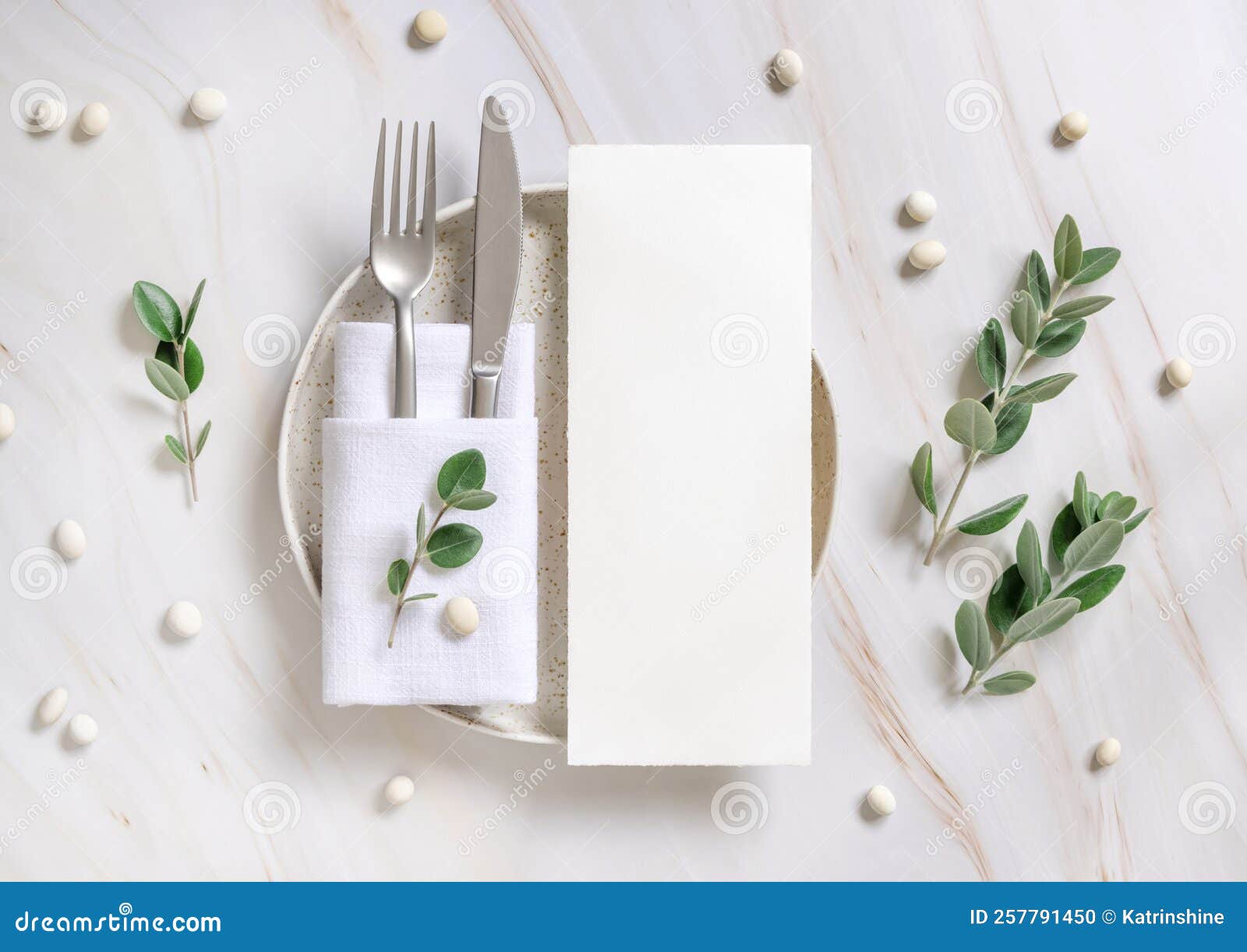 Elegant Table Setting with a Card Decorated with Eucalyptus Branches