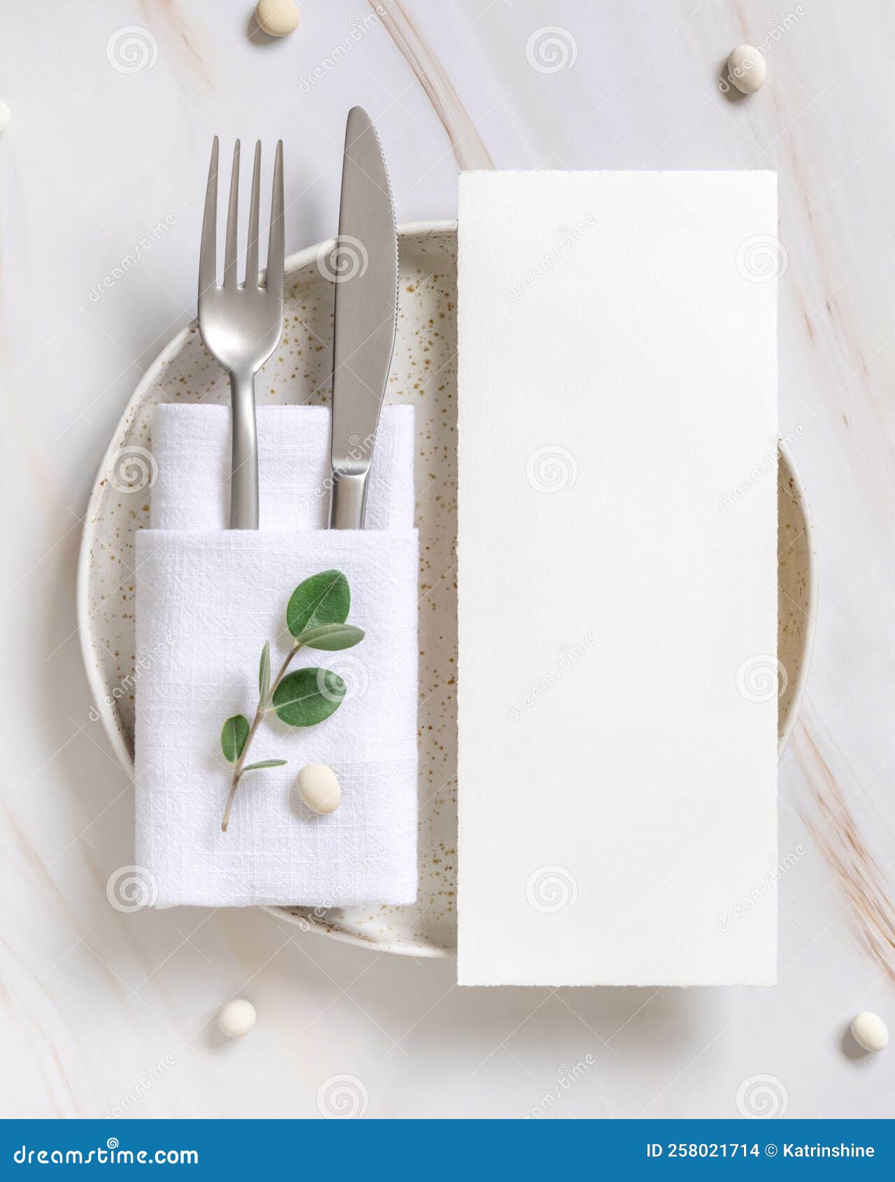 Elegant Table Setting with a Card Decorated with Eucalyptus Branches