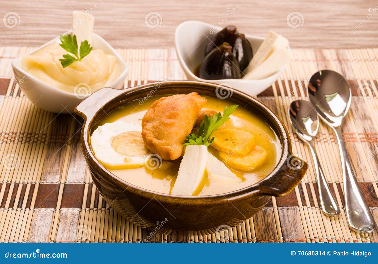 Elegant Table Setting with Full Serving of Traditional Fanesca Soup and  Accessories Stock Photo - Image of andes, delicious: 70680314