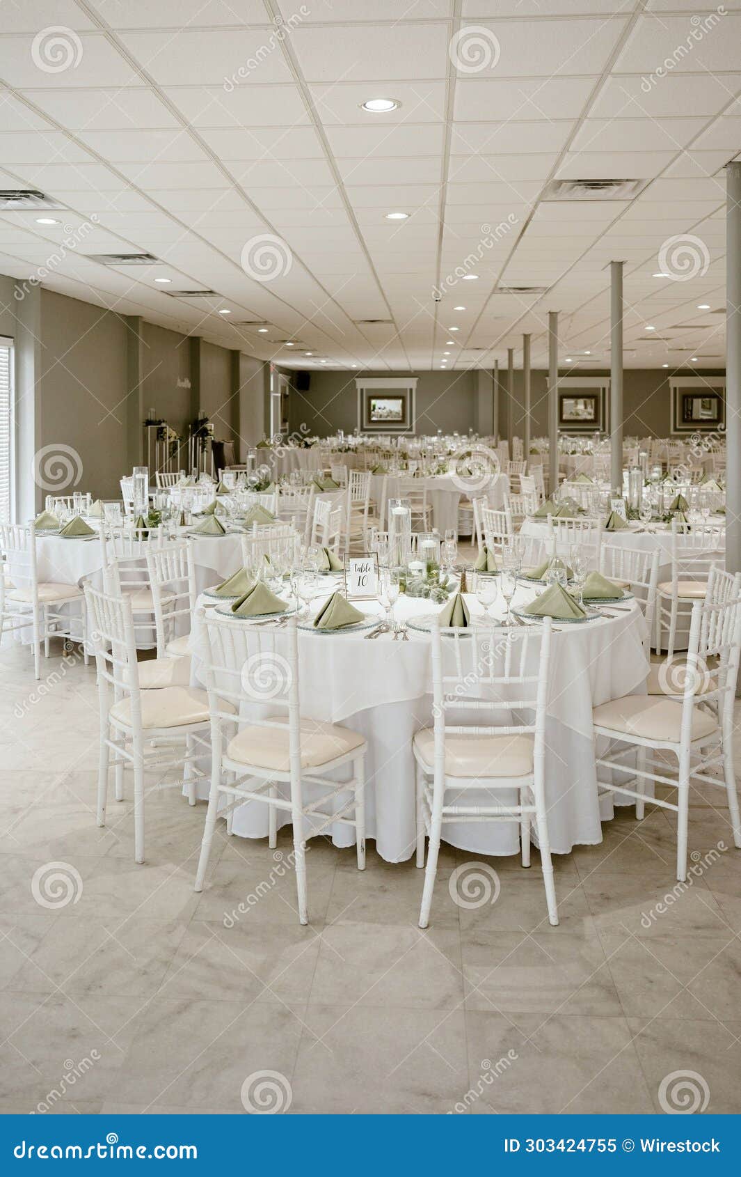 Elegant White Table Setting for a Wedding Reception with Pristine