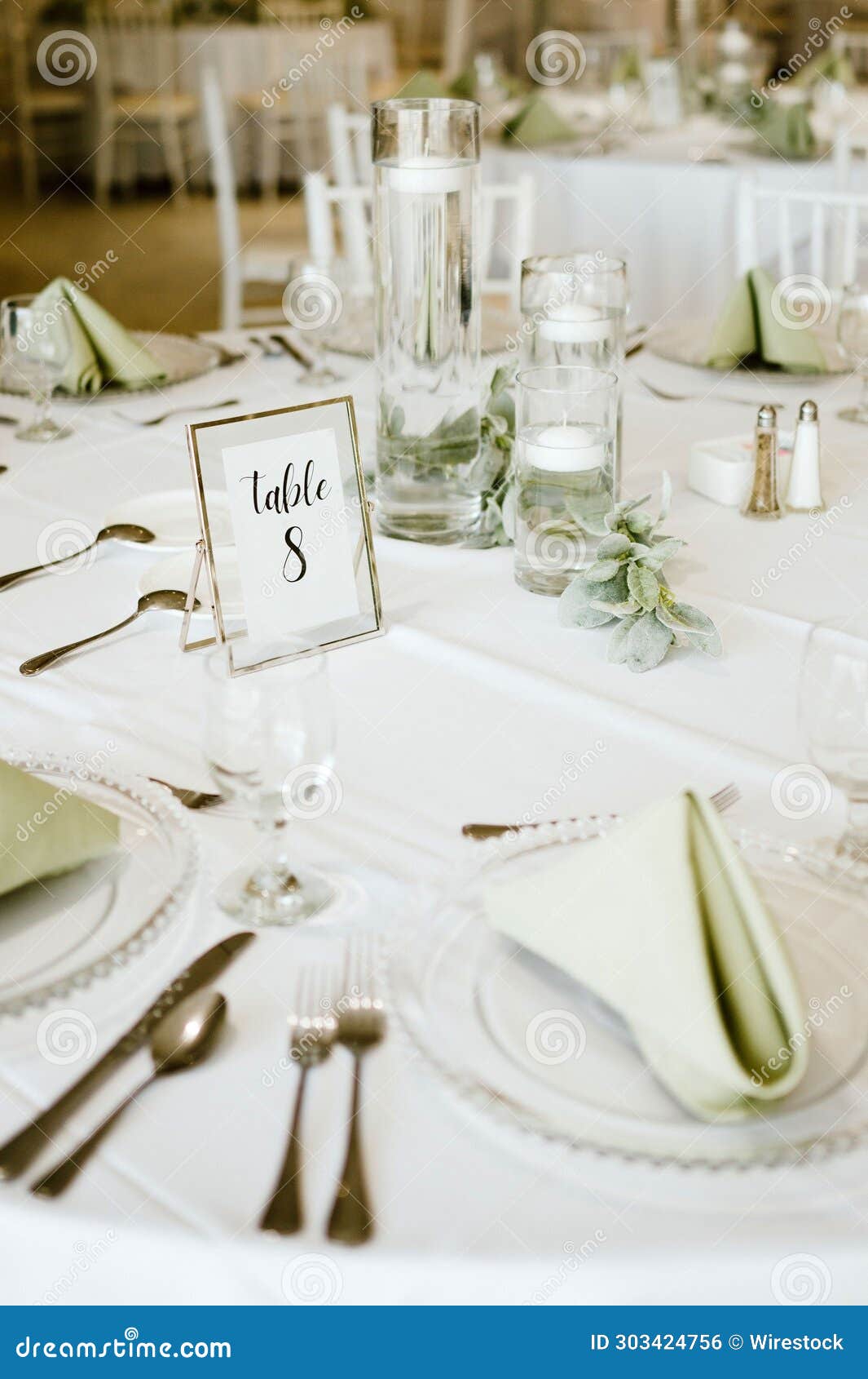Elegant White Table Setting for a Wedding Reception with Pristine