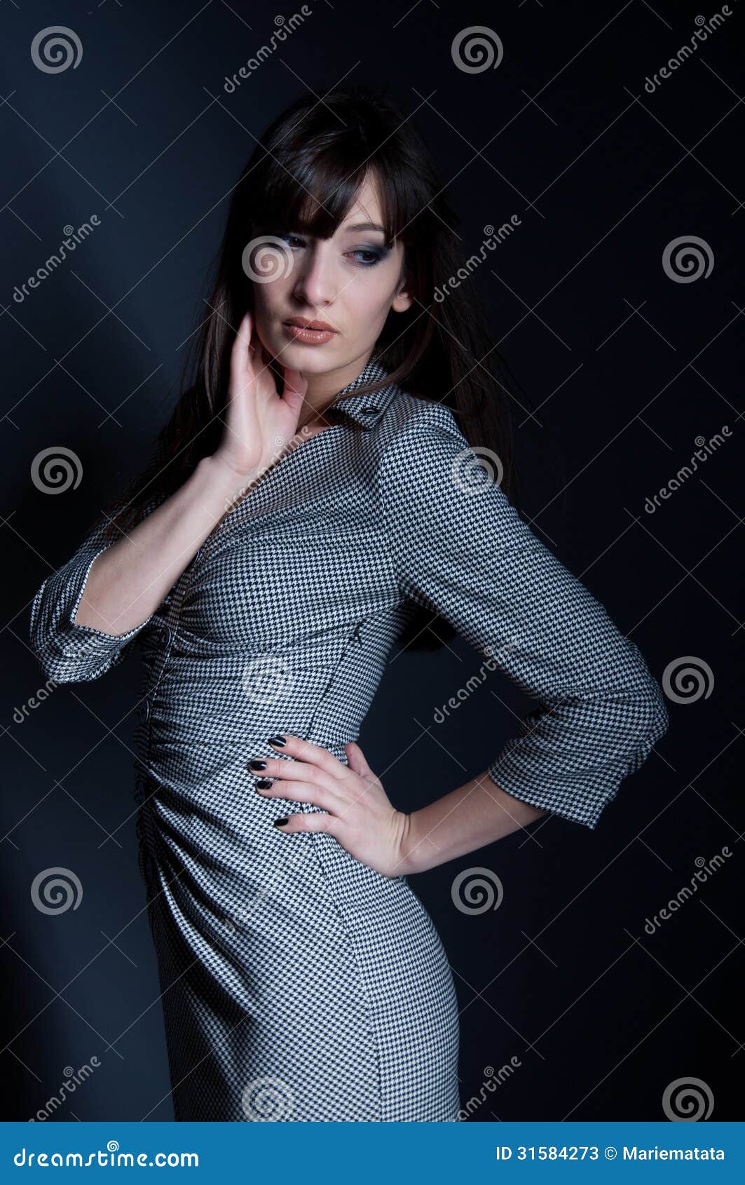 Elegant Woman In Checked Dress Stock Image - Image: 31584273