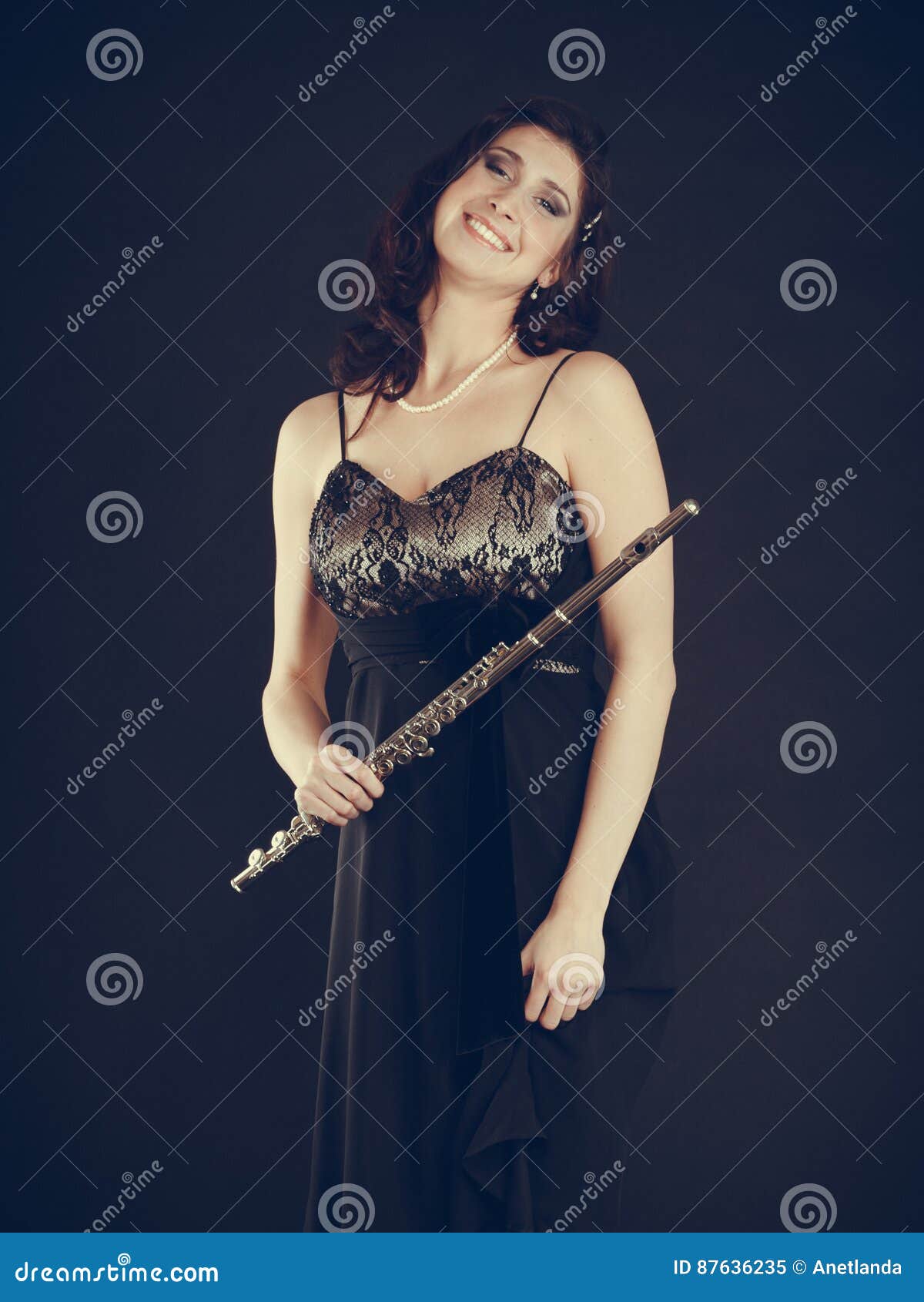 Elegant Woman with Flute Instrument. Stock Image - Image of instrument ...