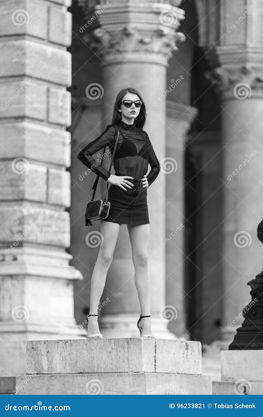 Elegant Woman with Mini Skirt and Sunglasses Stock Image - Image of ...