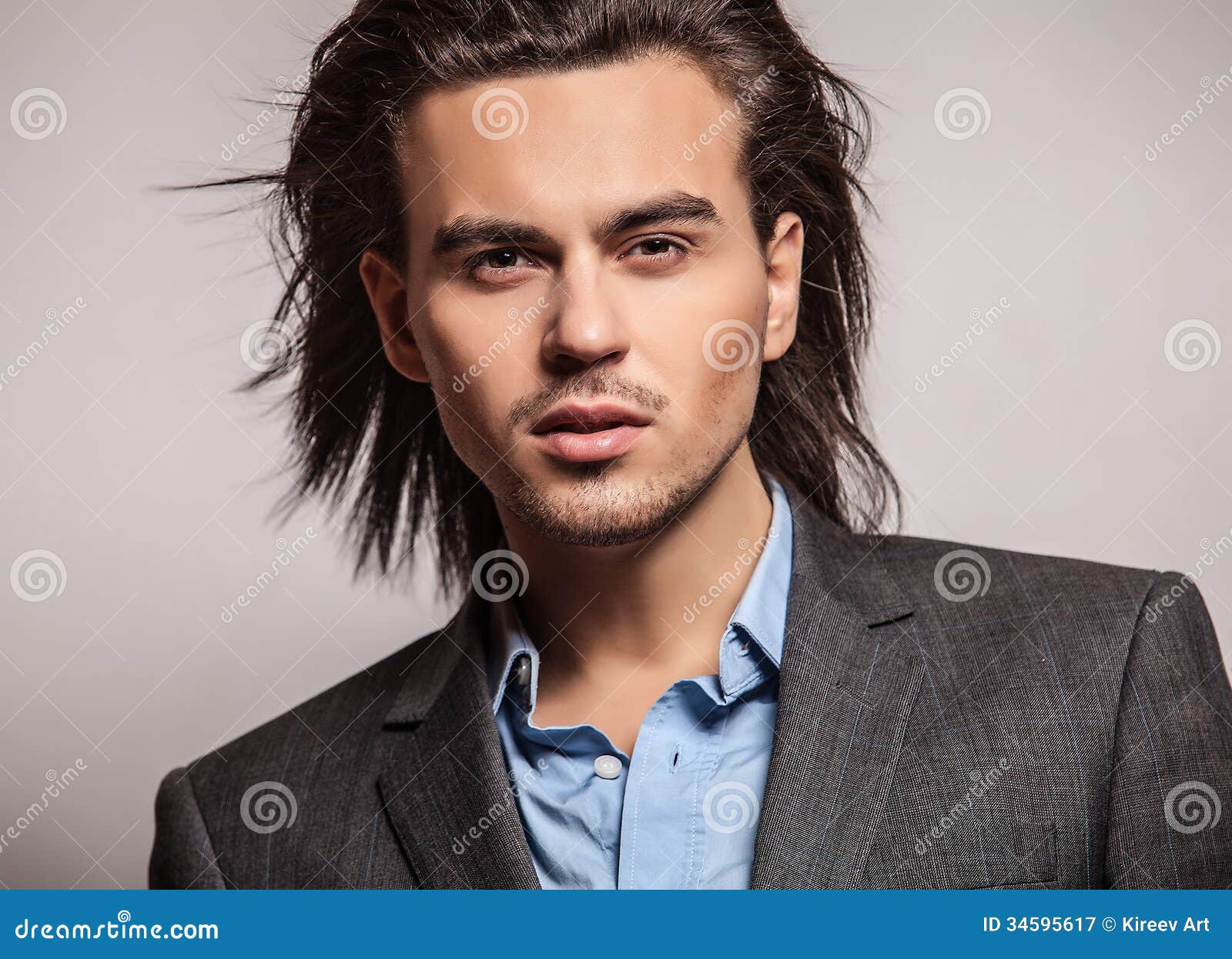 Elegant Young Handsome Long-haired Man in Costume. Stock Image - Image ...