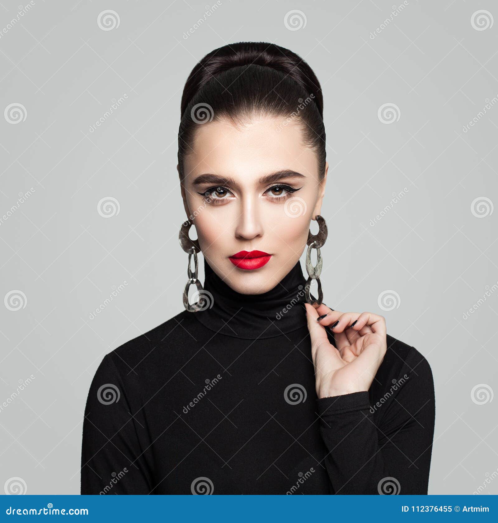 Elegant Young Woman With Hair Bun Hairstyle Stock Image Image Of