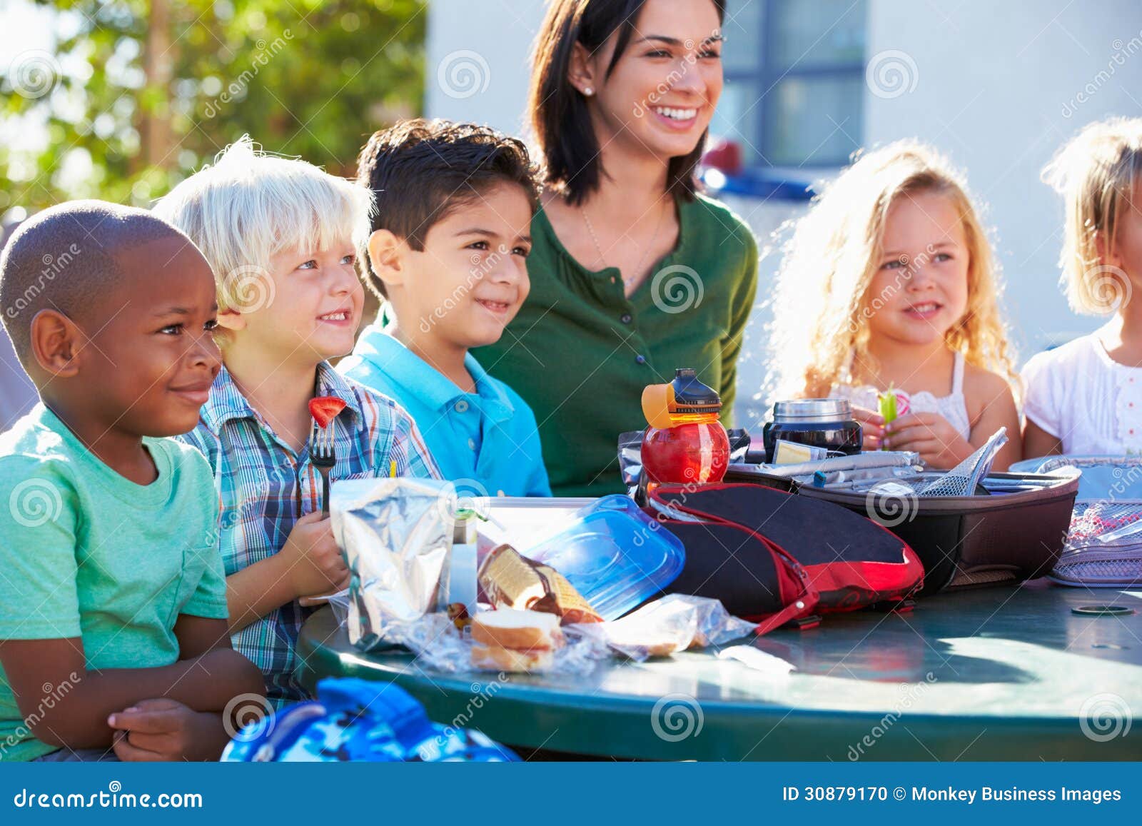 Elementary Pupils And Teacher Eating Lunch Stock Photo Image 30879170