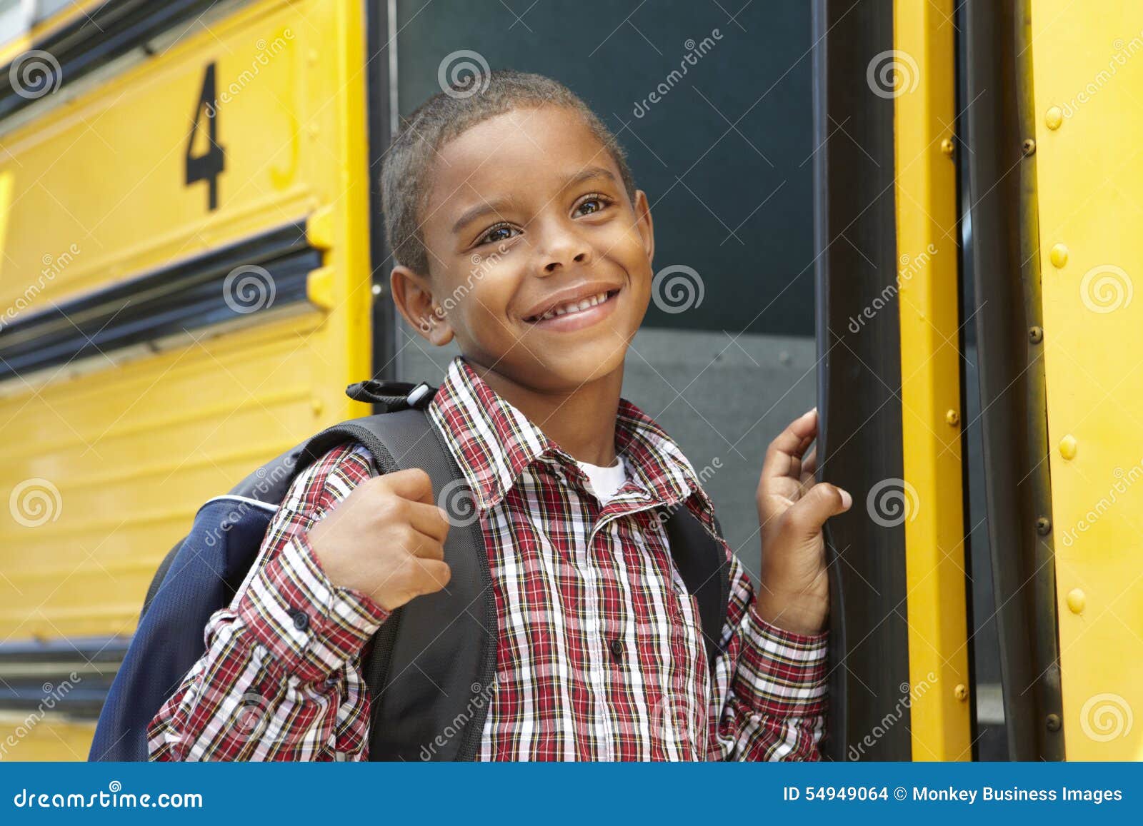 Elementary School Pupil Boarding Bus Stock Photo Image of school