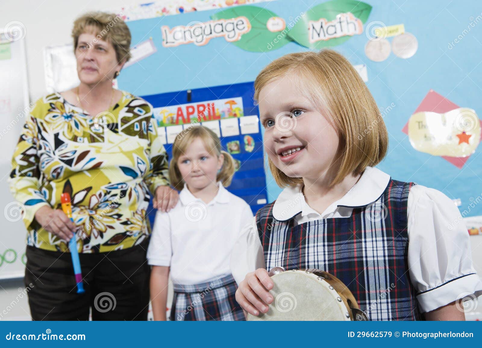 Elementary Student with Tambourine in Music Class Stock Image Image