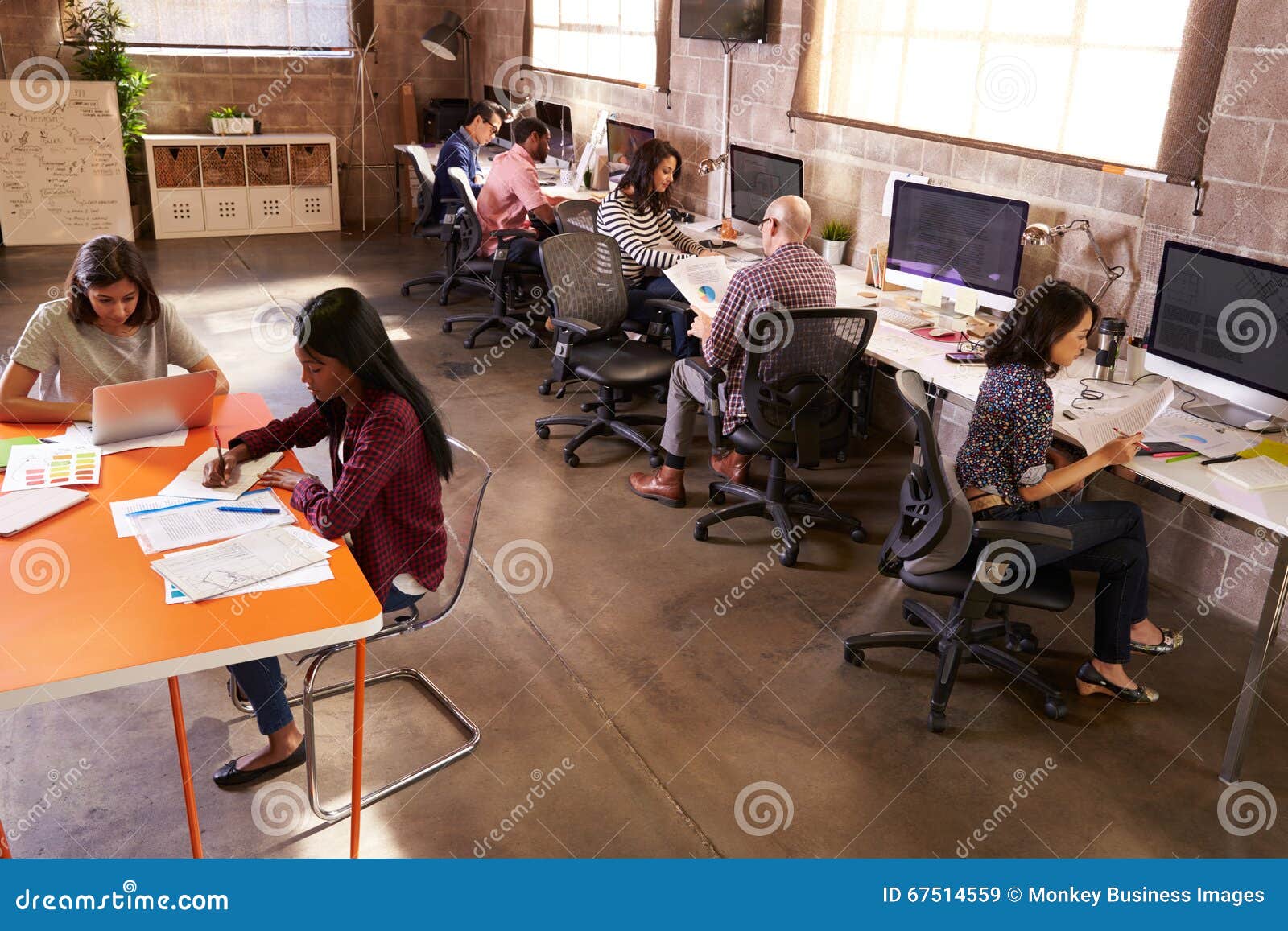 elevated view of people working in modern  office